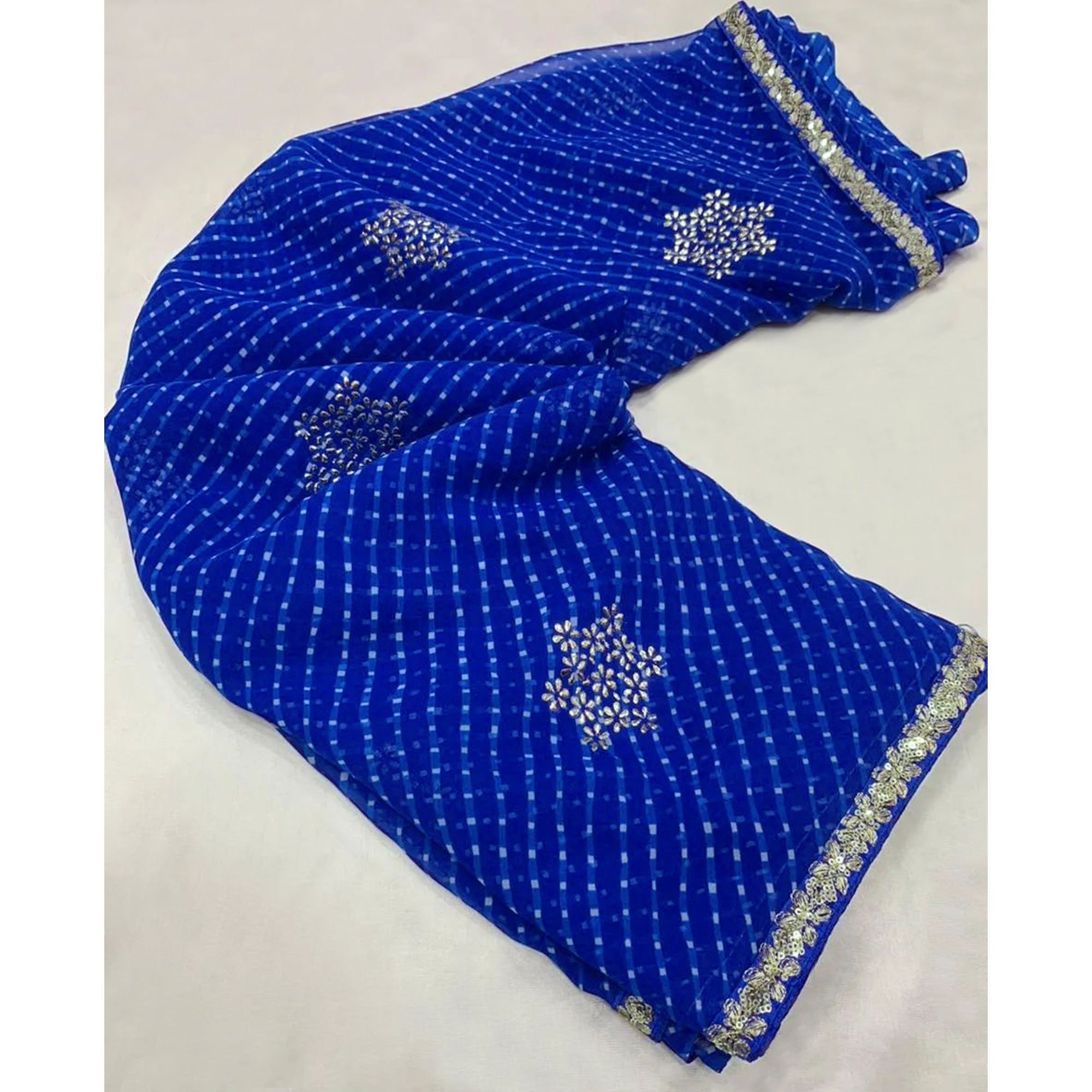 Blue Printed Georgette Saree With lace Border