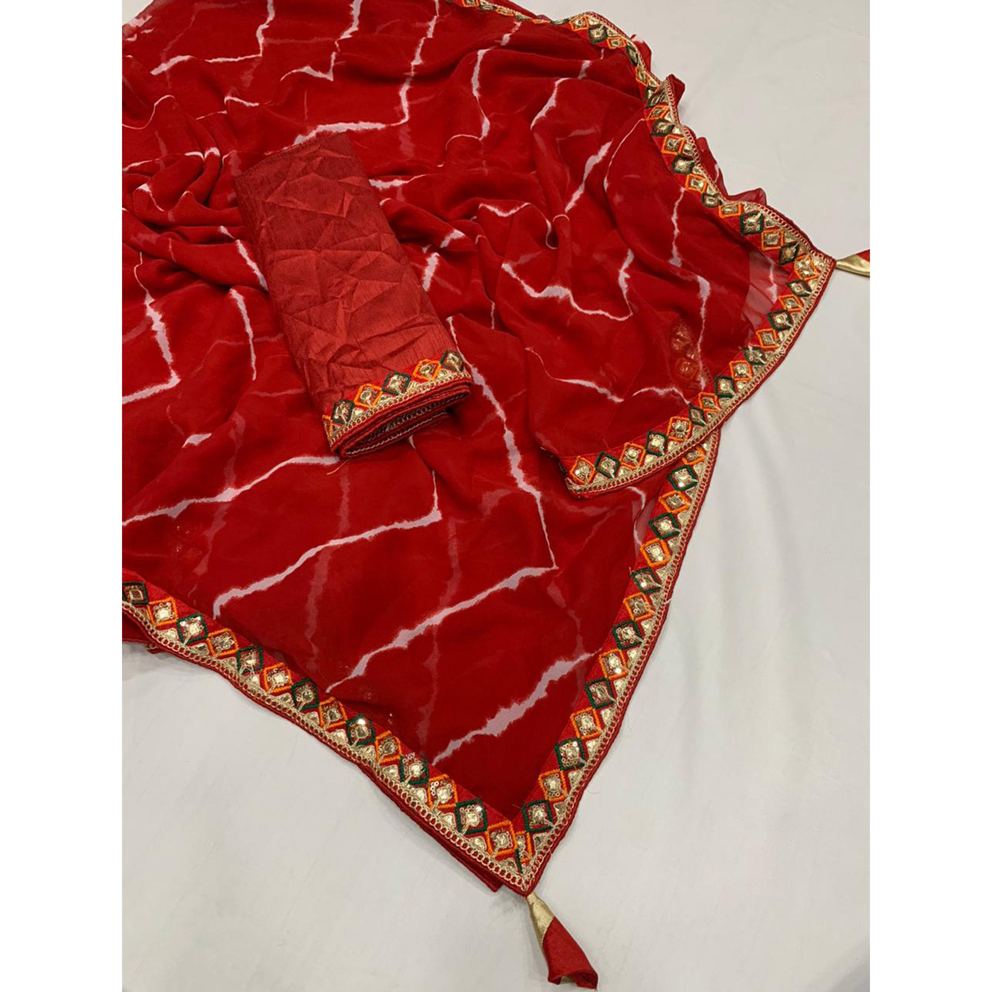 Red Leheriya Printed Georgette Saree With Sequins Border