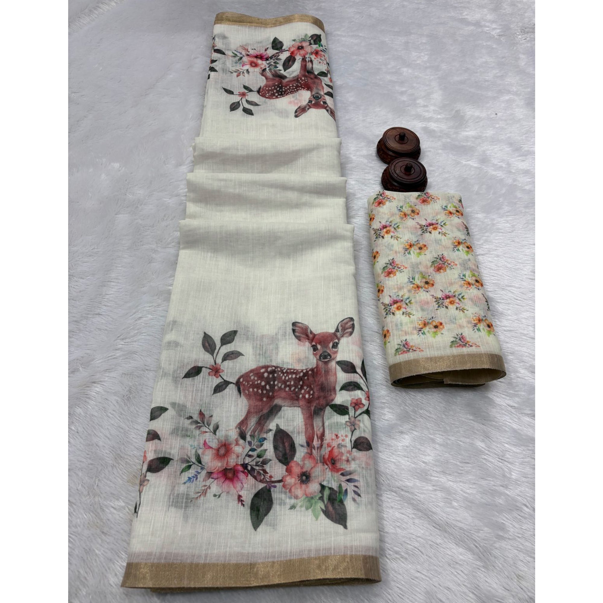 Off White Handprinted Linen Saree with Beautifully Woven Zari Edging