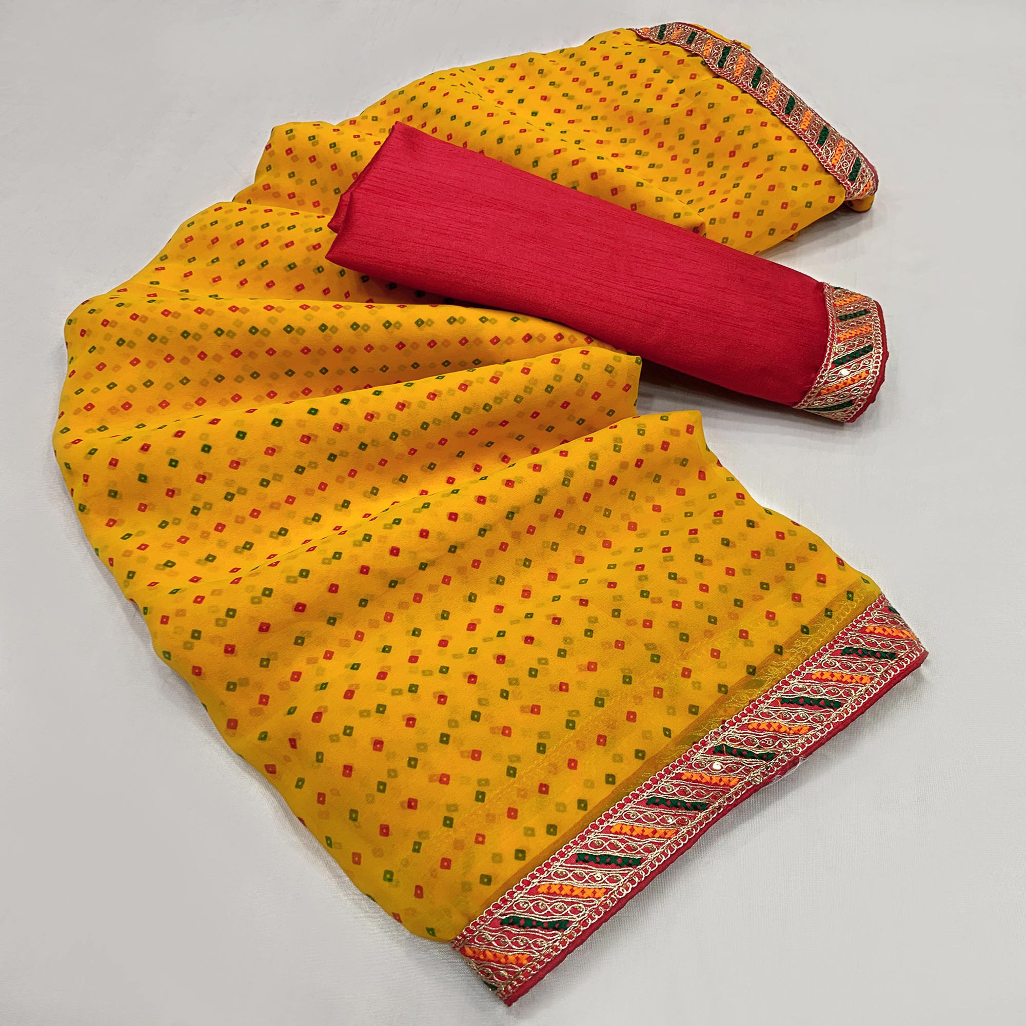 Yellow Bandhani Printed With Sequins Border Georgette Saree