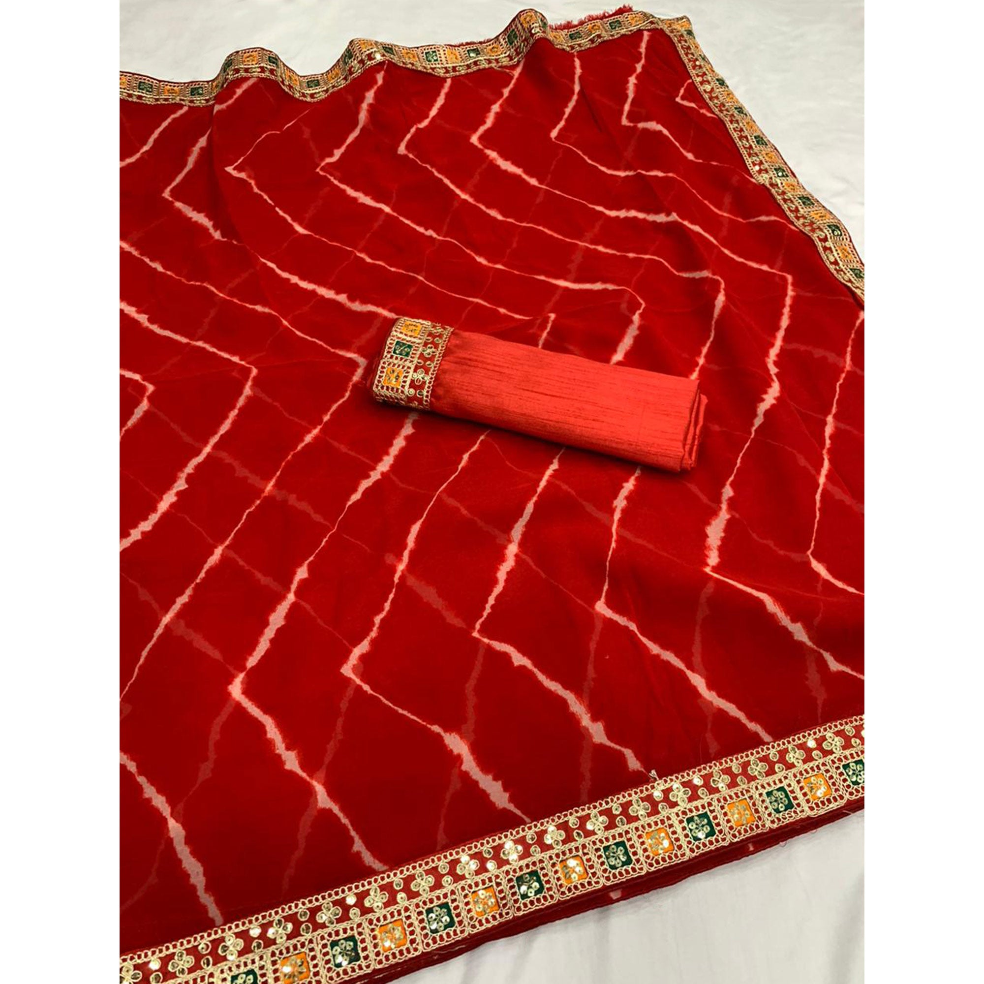 Red Leheriya Printed Georgette Saree With Sequins Border