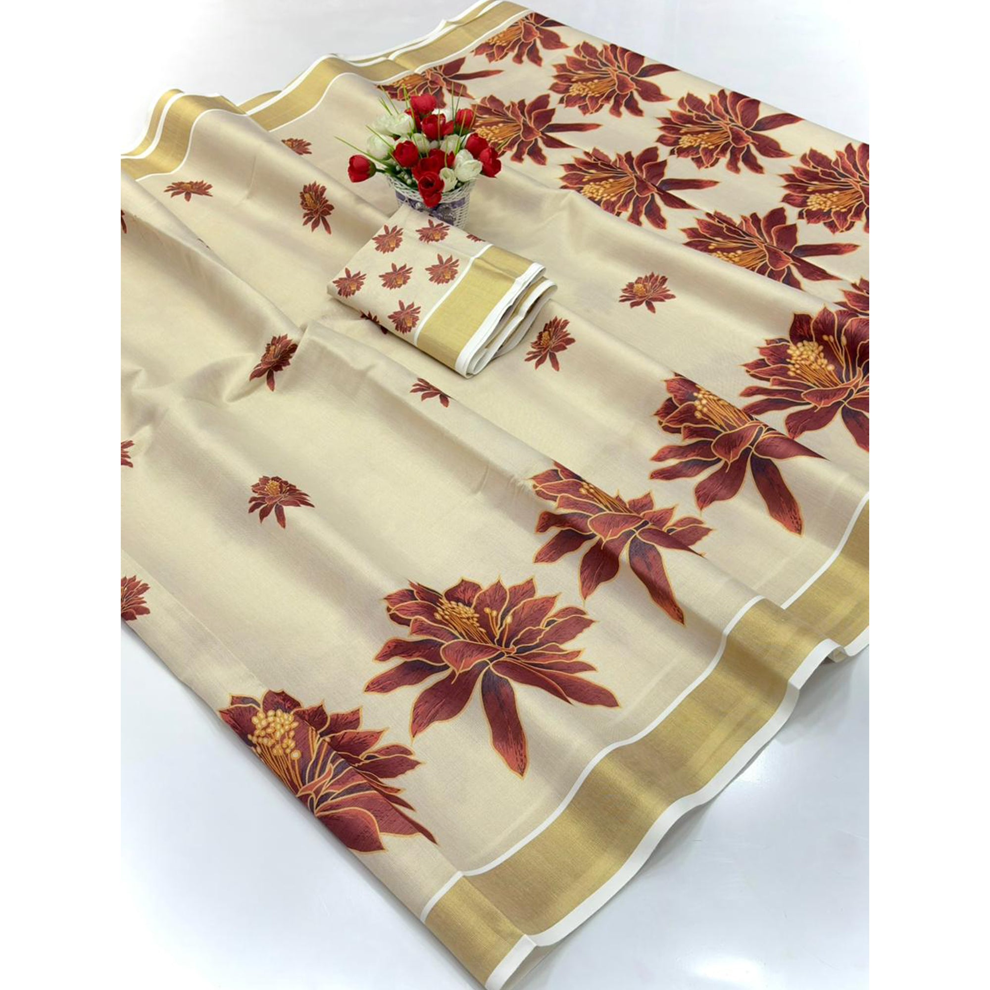 Chikoo Floral Mill Print Cotton Silk Saree Enhanced With Premium Zari Weaving Border Work