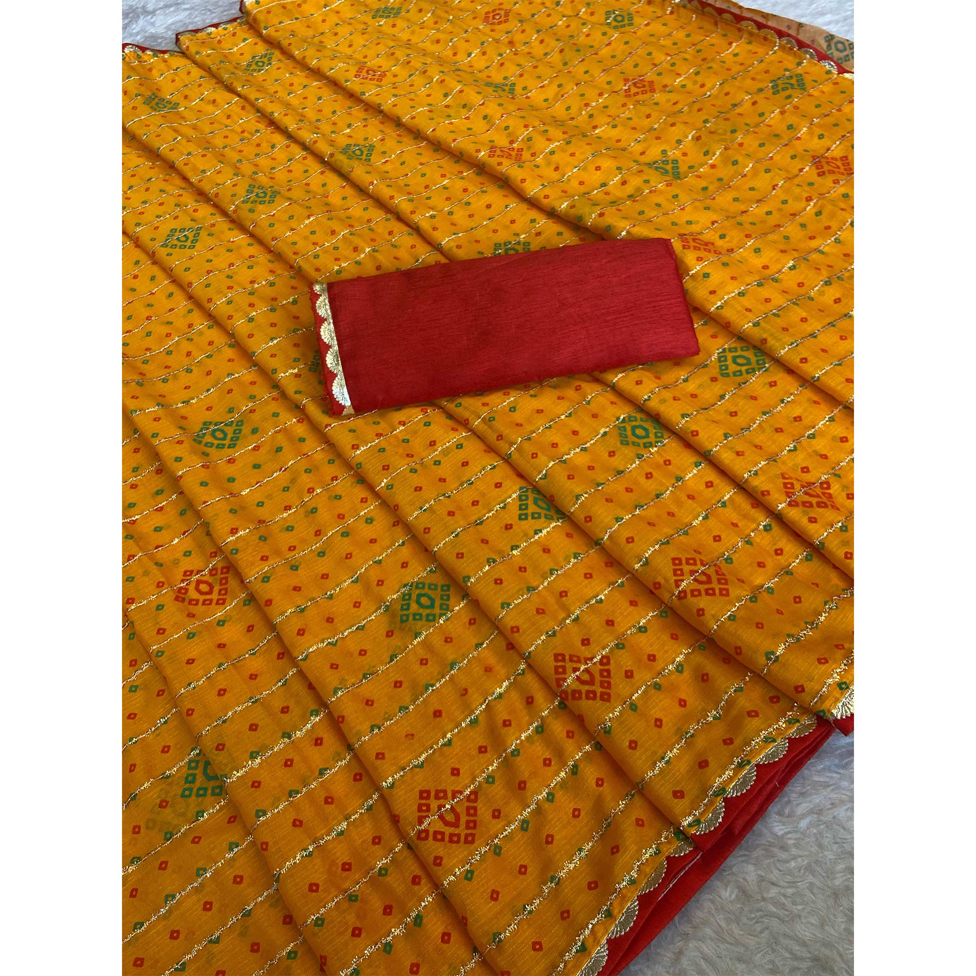 Mustard Bandhani Printed Chiffon Saree with Graceful Touches of Zari Work