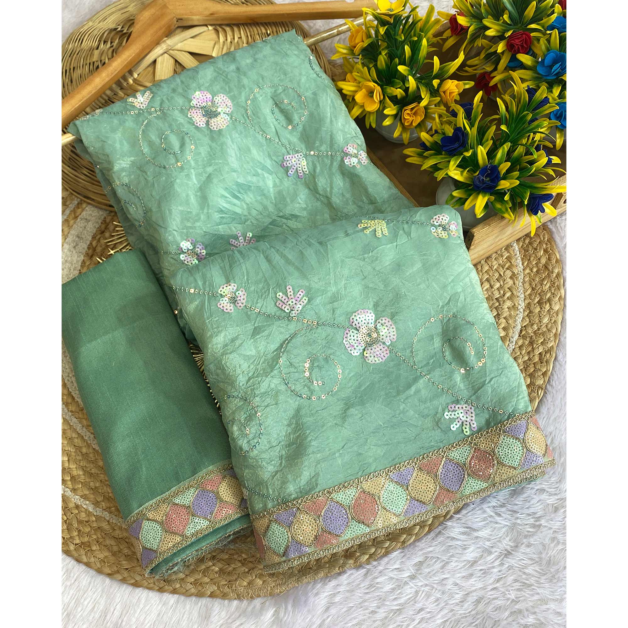 Sea Green Lightweight Tissue Saree with Subtle Yet Elegant Sequins Work