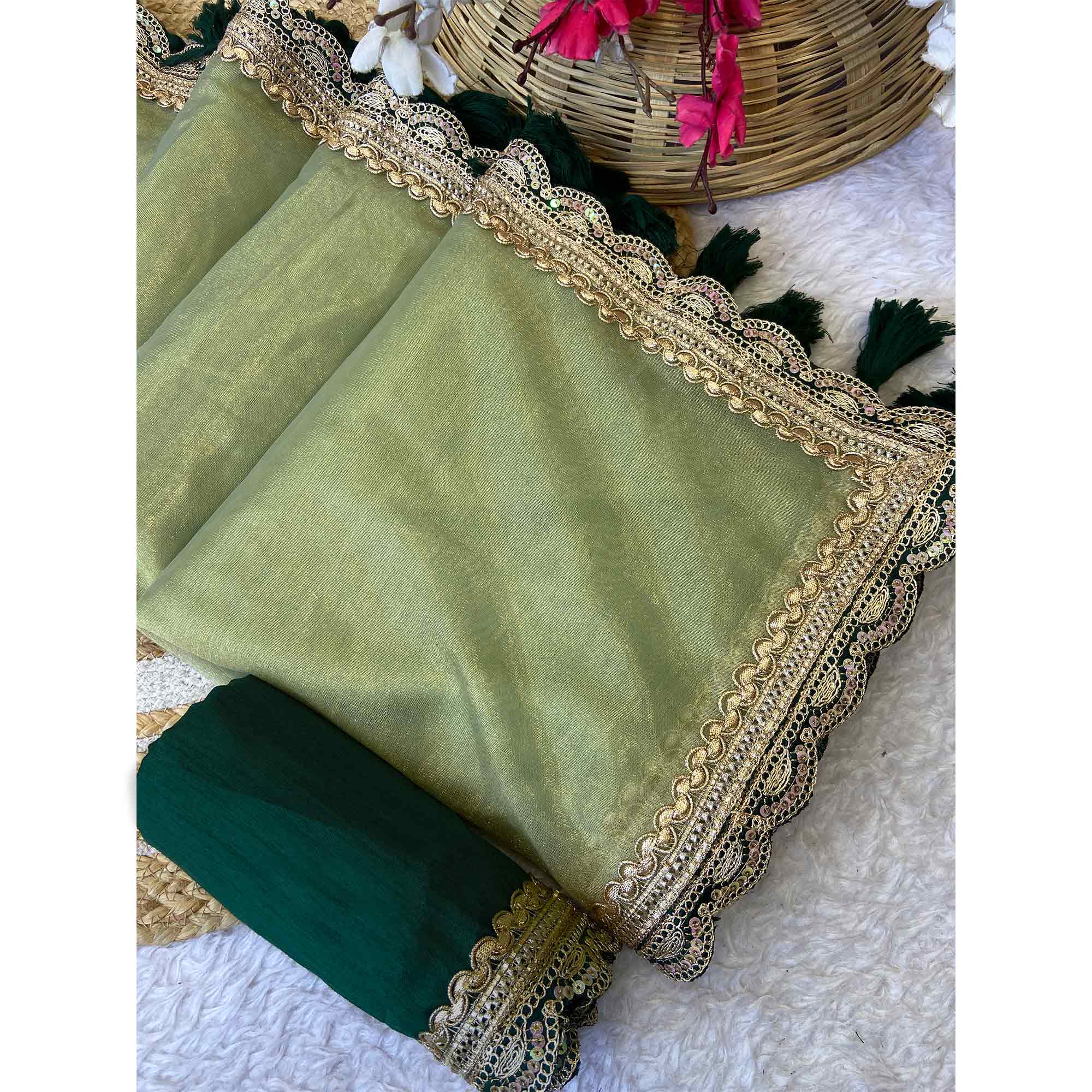 Pista Green Net Saree With Intricate Sequin Embroidery & Tassel Embellished Pallu