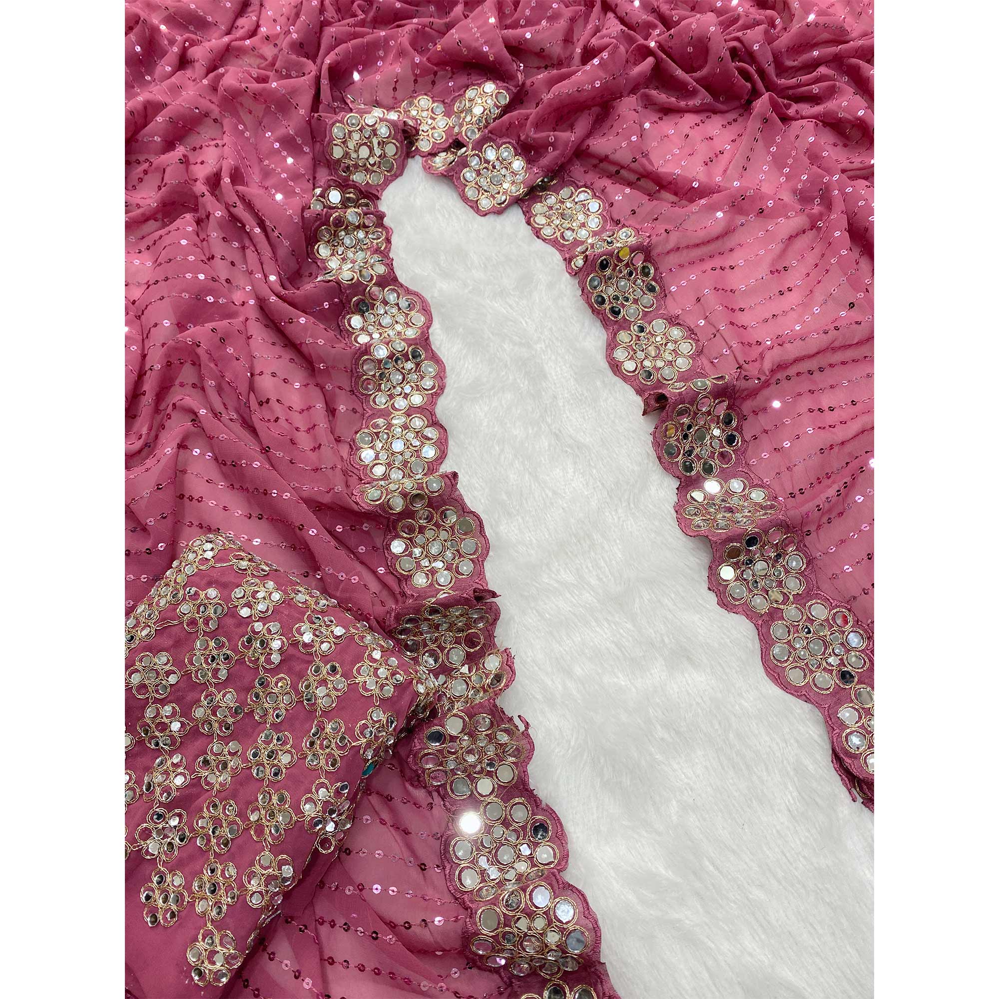 Stunning Pink Georgette Party Wear Saree Adorned with Heavy Sequins Embellishment