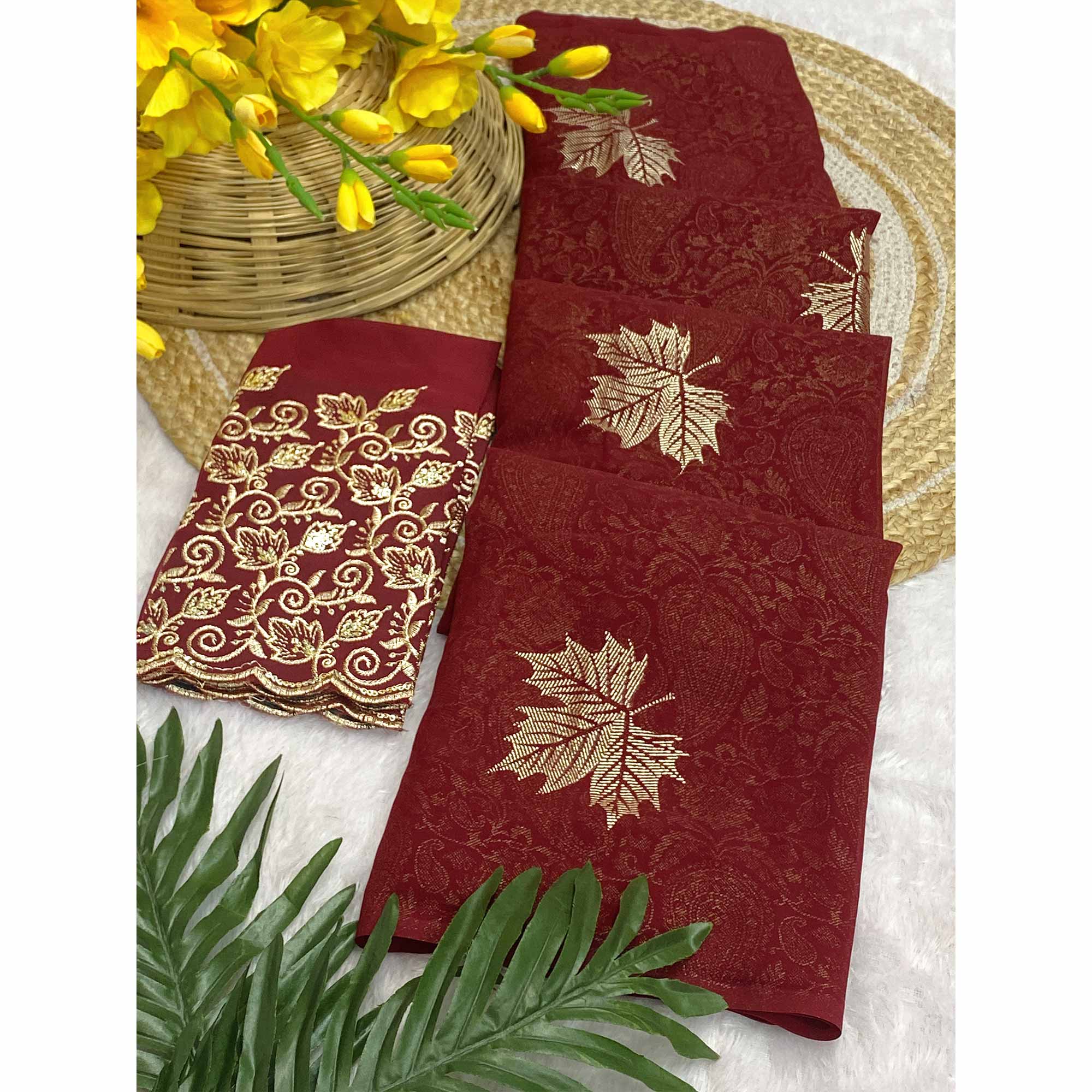 Maroon Georgette Saree With Foil Printed Paisley & Leaf Motifs Finished With A Tassel Pallu
