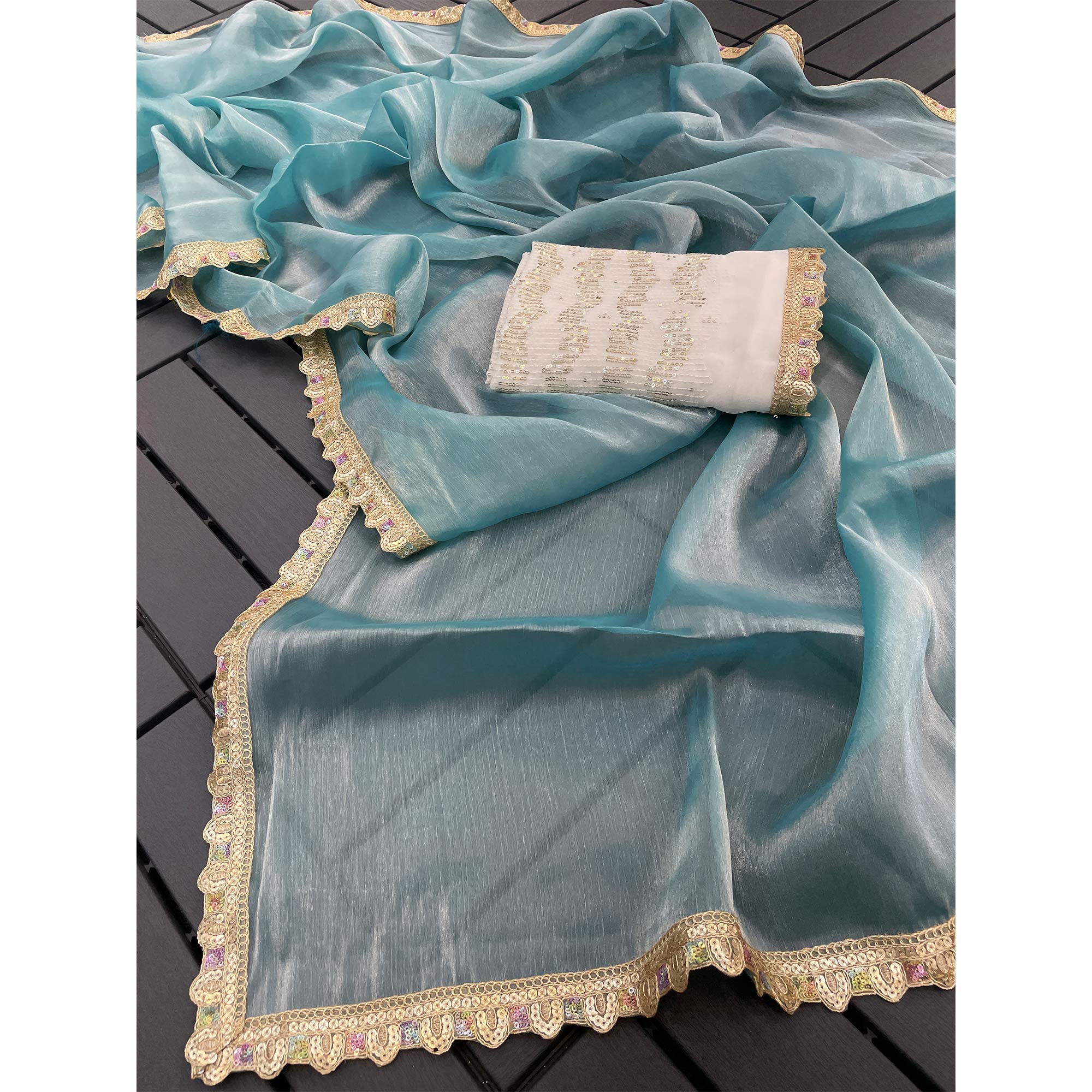 Turquoise Solid Satin Burberry Saree With Sparkling Sequins Embroidered Lace Border