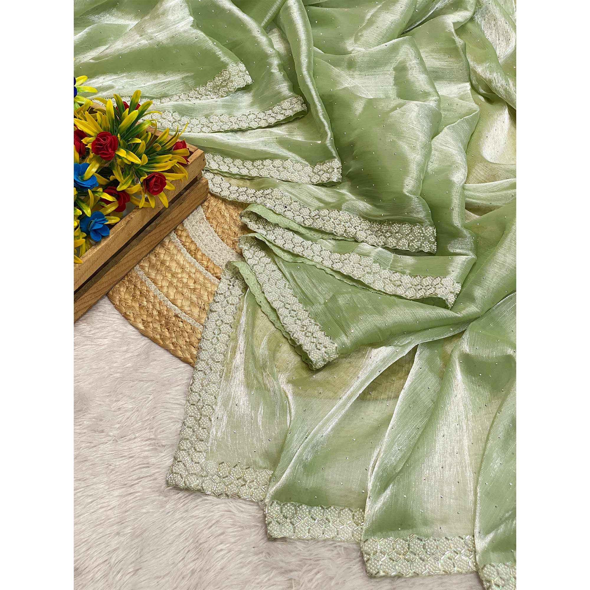 Pista Green Satin Burberry Saree Adorned With Sparkling Swarovski & Elegant Moti Work Border