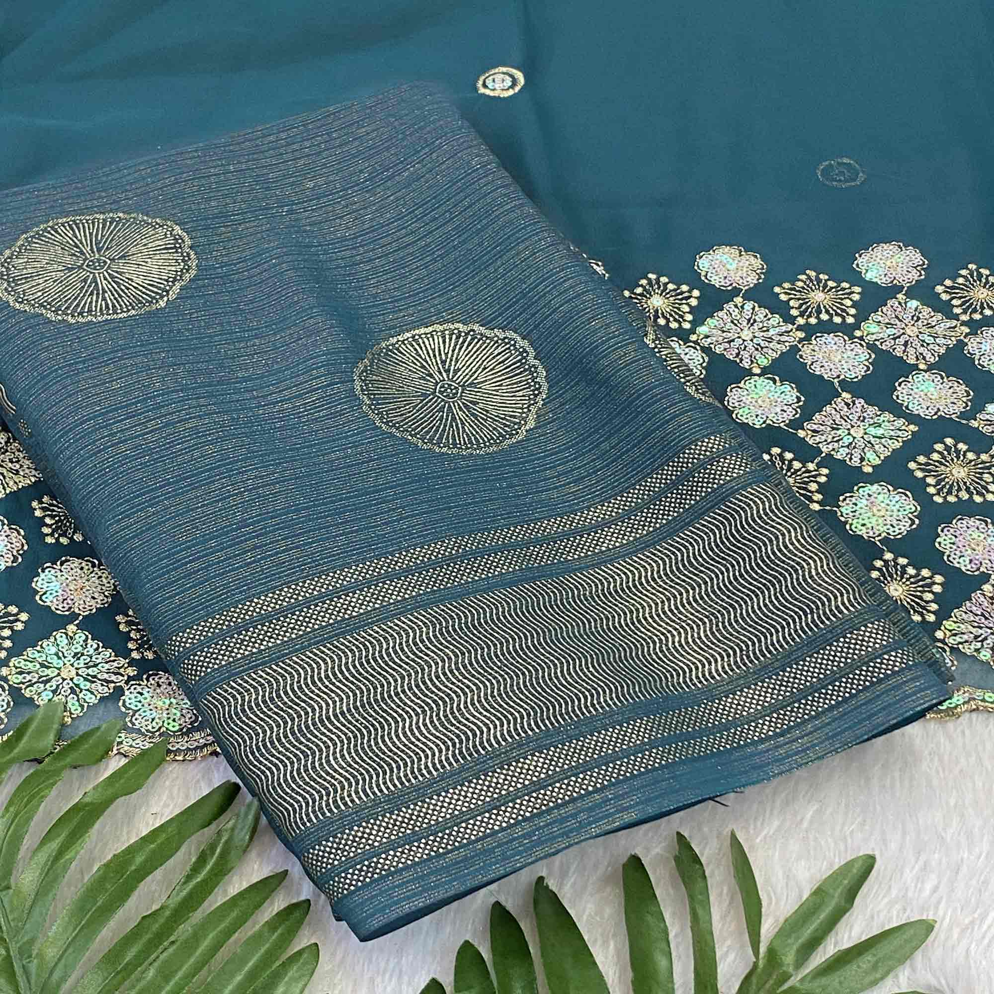 Blue Georgette Saree With Shimmering Floral Foil Print & Tassel Accented Pallu