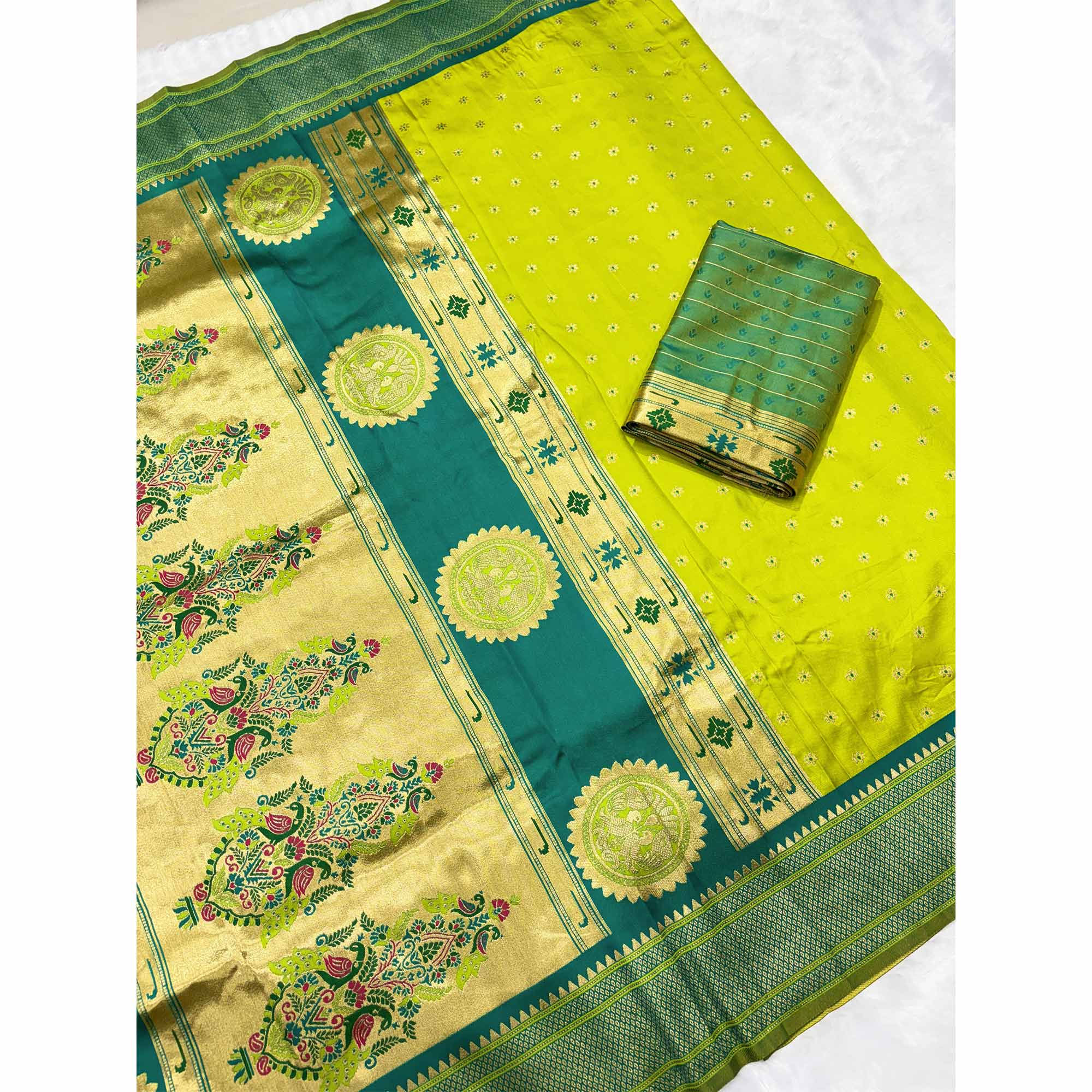 Graceful Green Silk Blend Saree Adorned With Intricate Floral Zari Weaving