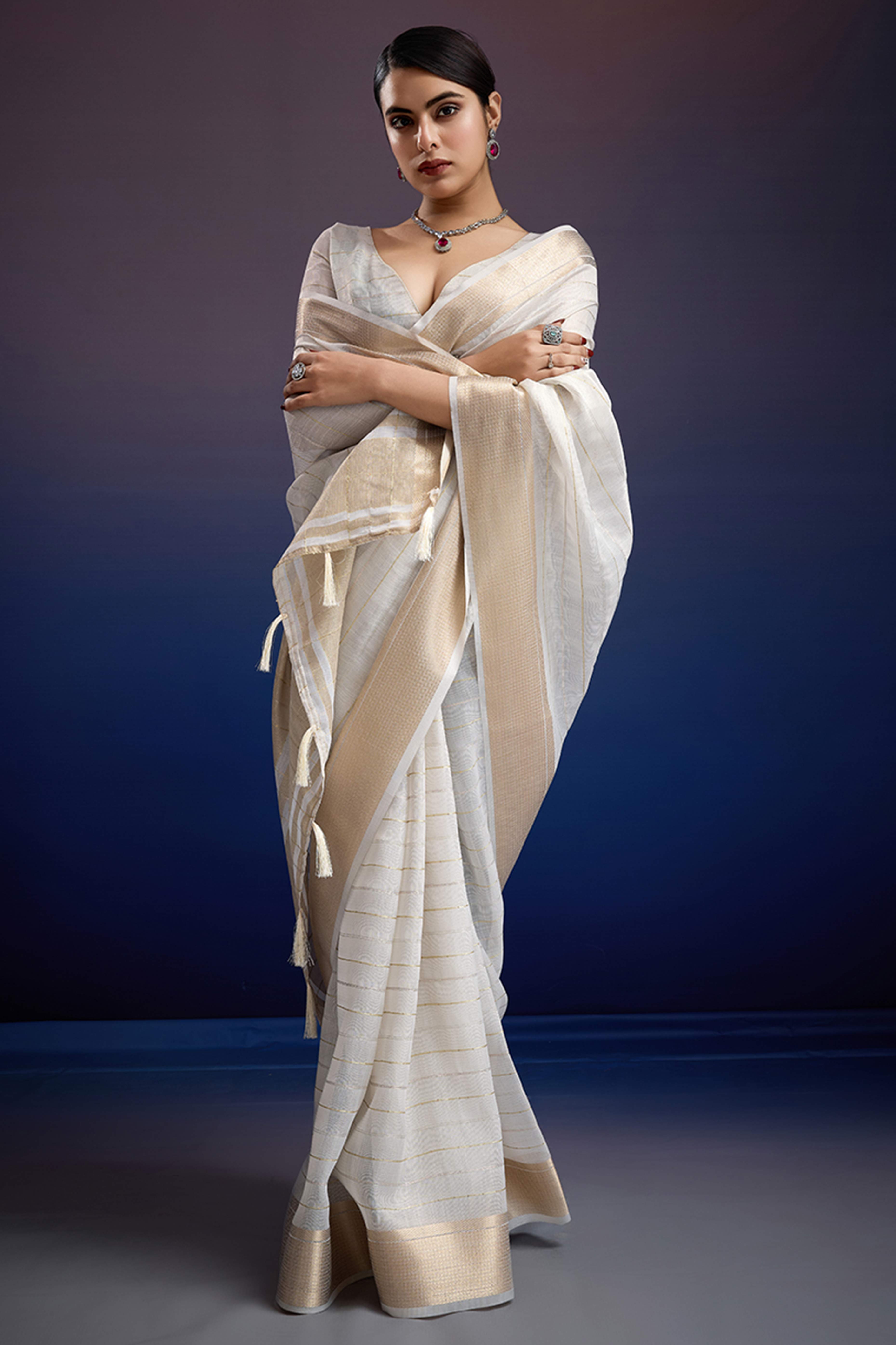 Off White Pure Linen Saree with Gold Toned Zari Weave