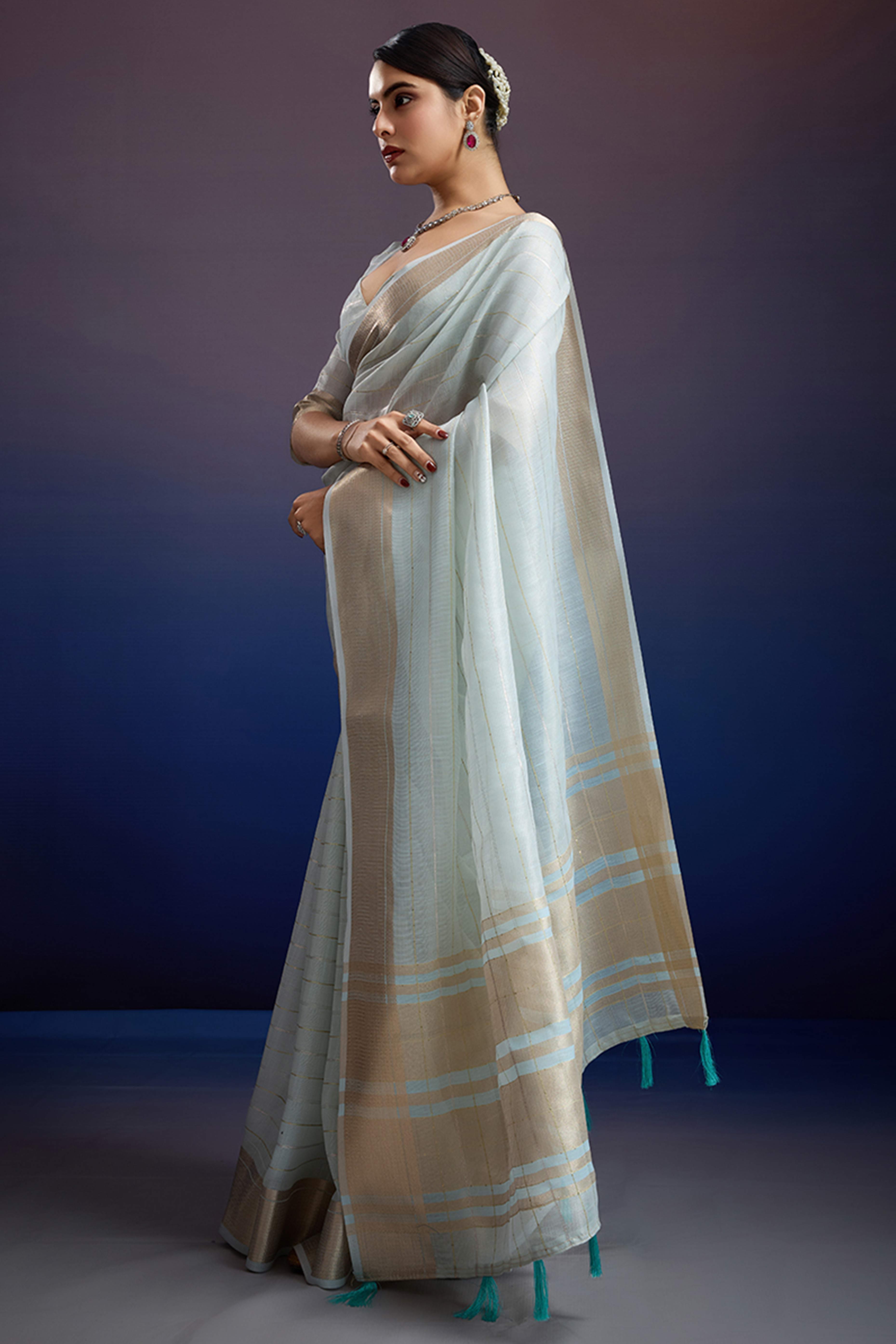 Pastel Blue Pure Linen Saree with Gold Toned Zari Weave
