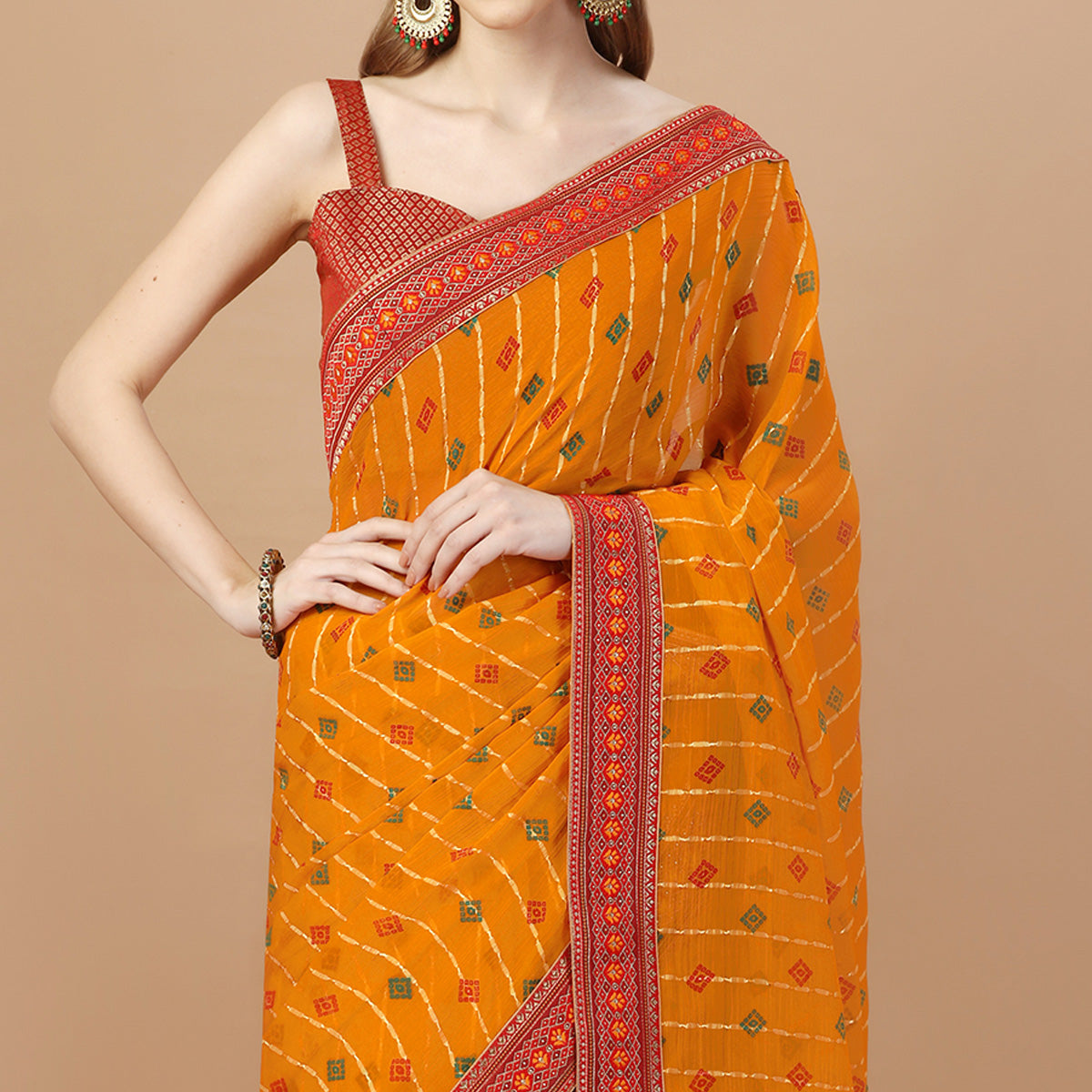 Orange Foil Printed Chiffon Saree With Lace Border