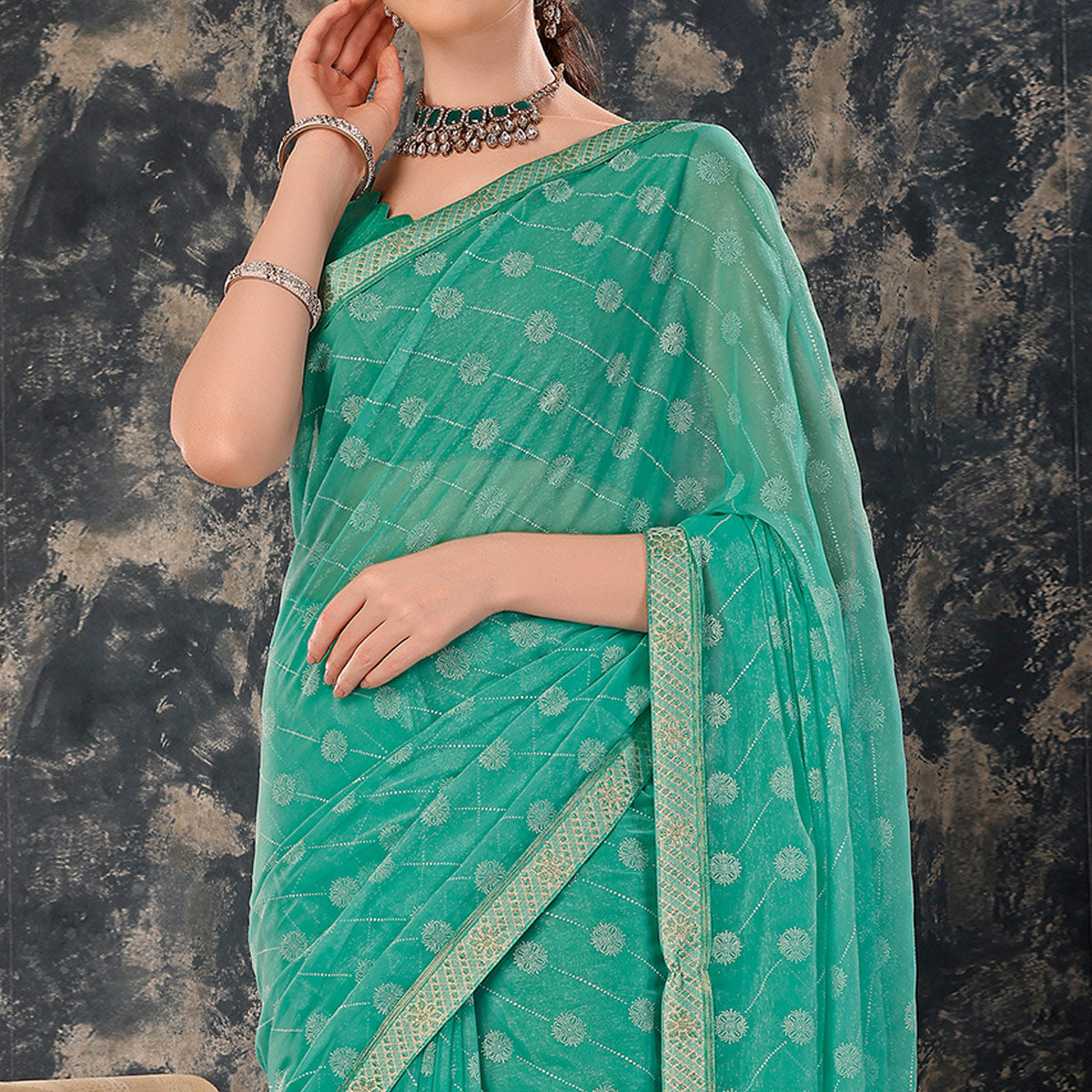 Turquoise Printed Chiffon Saree With Lace Border