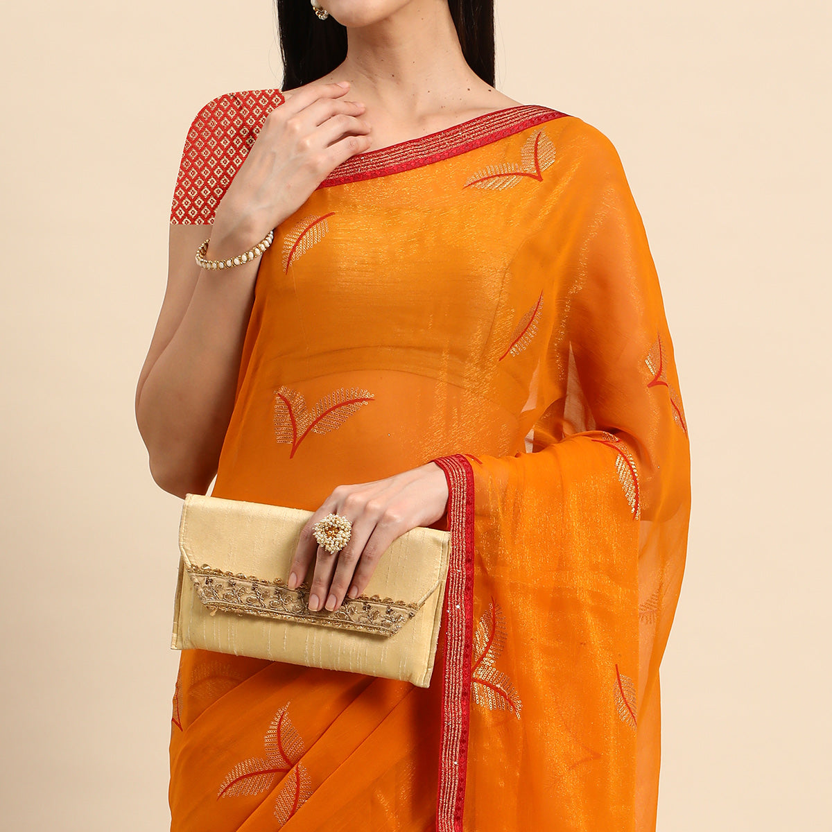 Orange Sequins Embroidered Chiffon Saree With Tassels