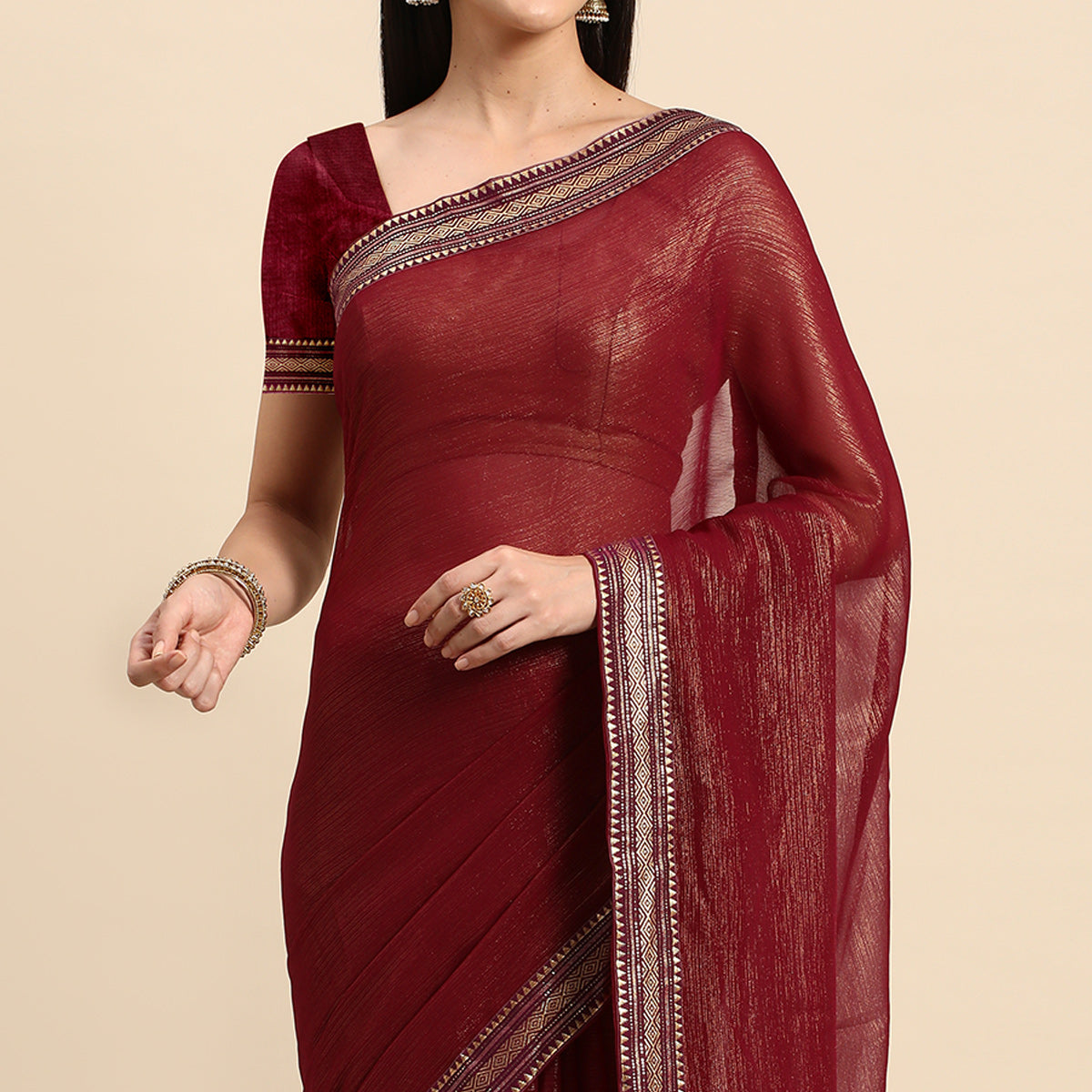 Wine Solid With Woven Border Chiffon Saree With Tassels