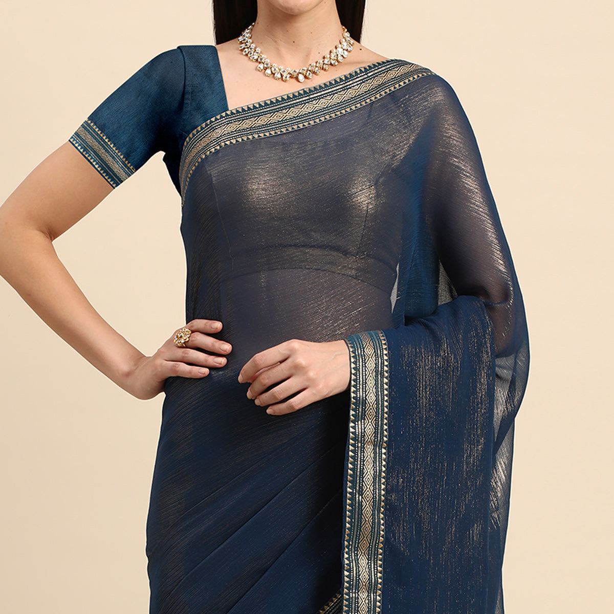 Blue Solid With Woven Border Chiffon Saree With Tassels