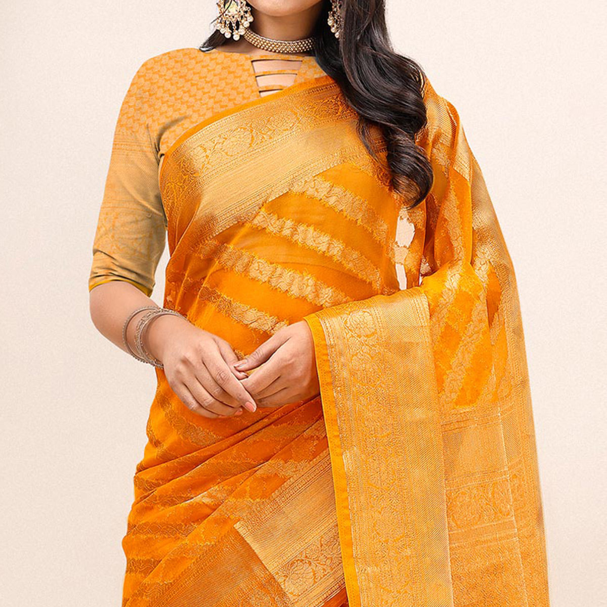 Orange Woven Organza Saree With Tassels