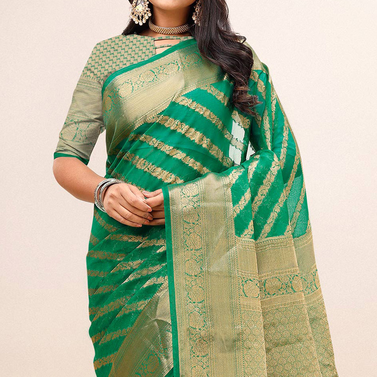 Green Woven Organza Saree With Tassels