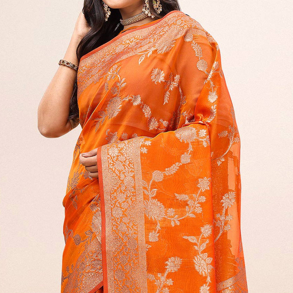 Orange Woven Organza Saree With Tassels