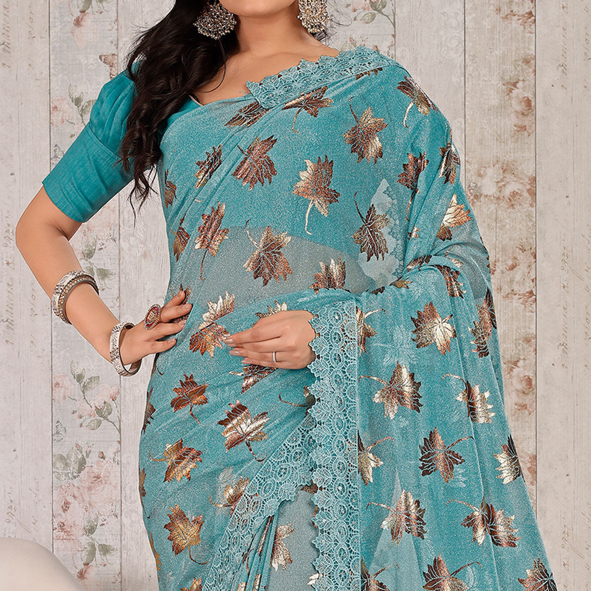 Blue Foil Printed Lycra Saree With Embroidered Lace Border