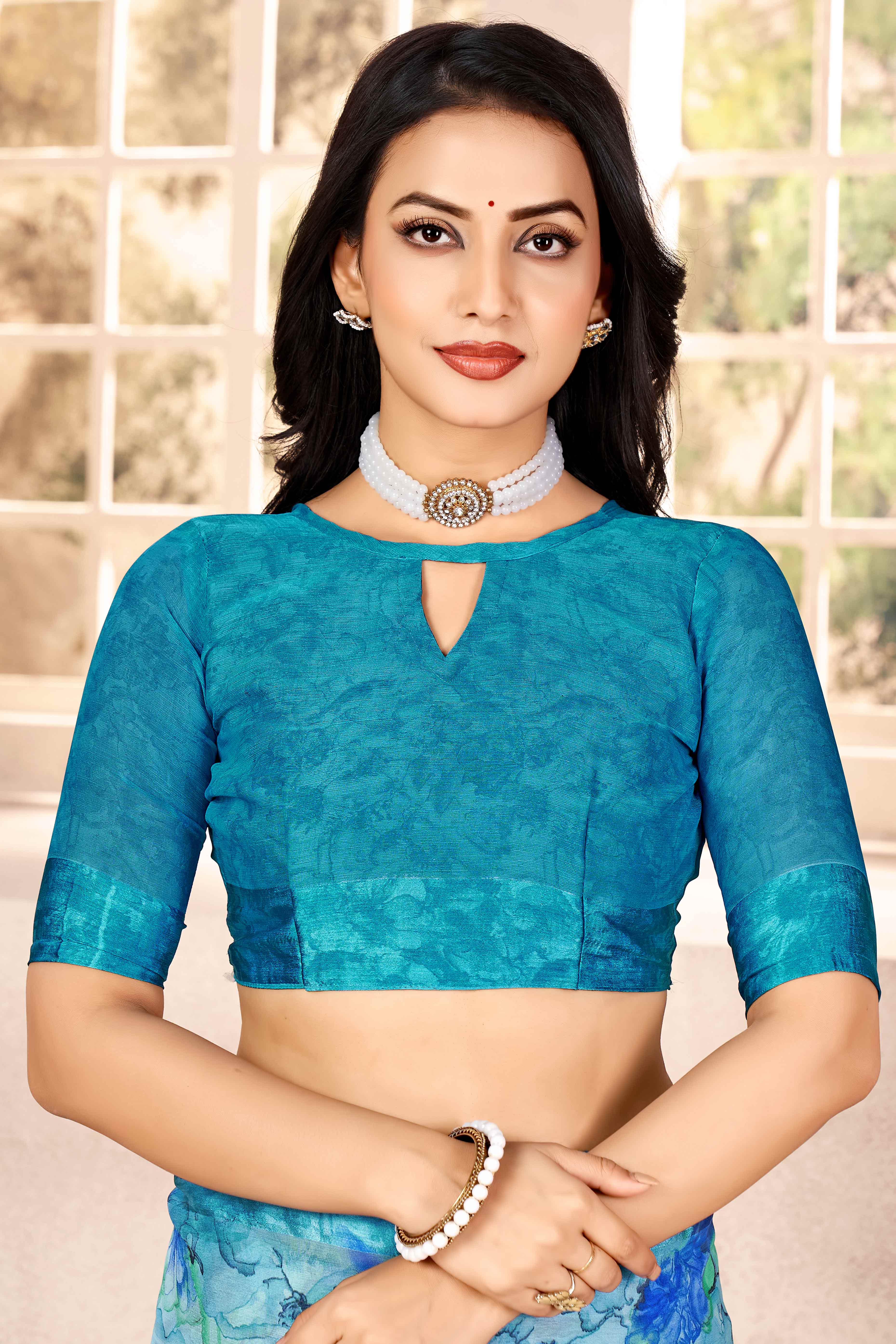 Blue Chiffon Saree With Delicate Floral Prints & Elegant Woven Border