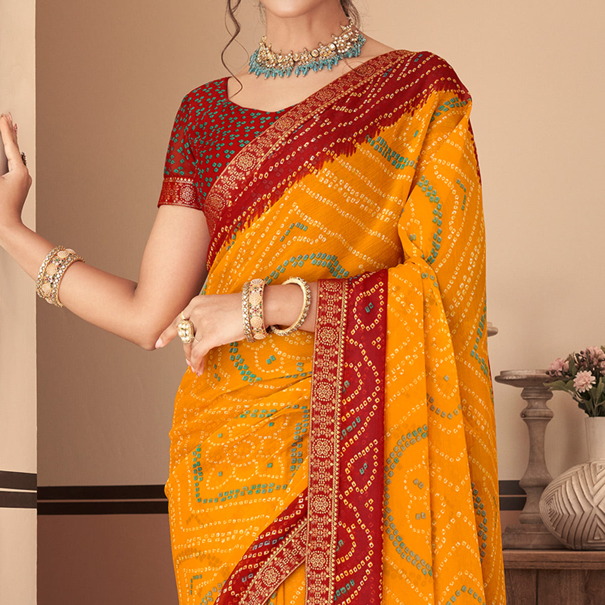 Yellow & Maroon Bandhani Printed Chiffon Saree With Lace Border