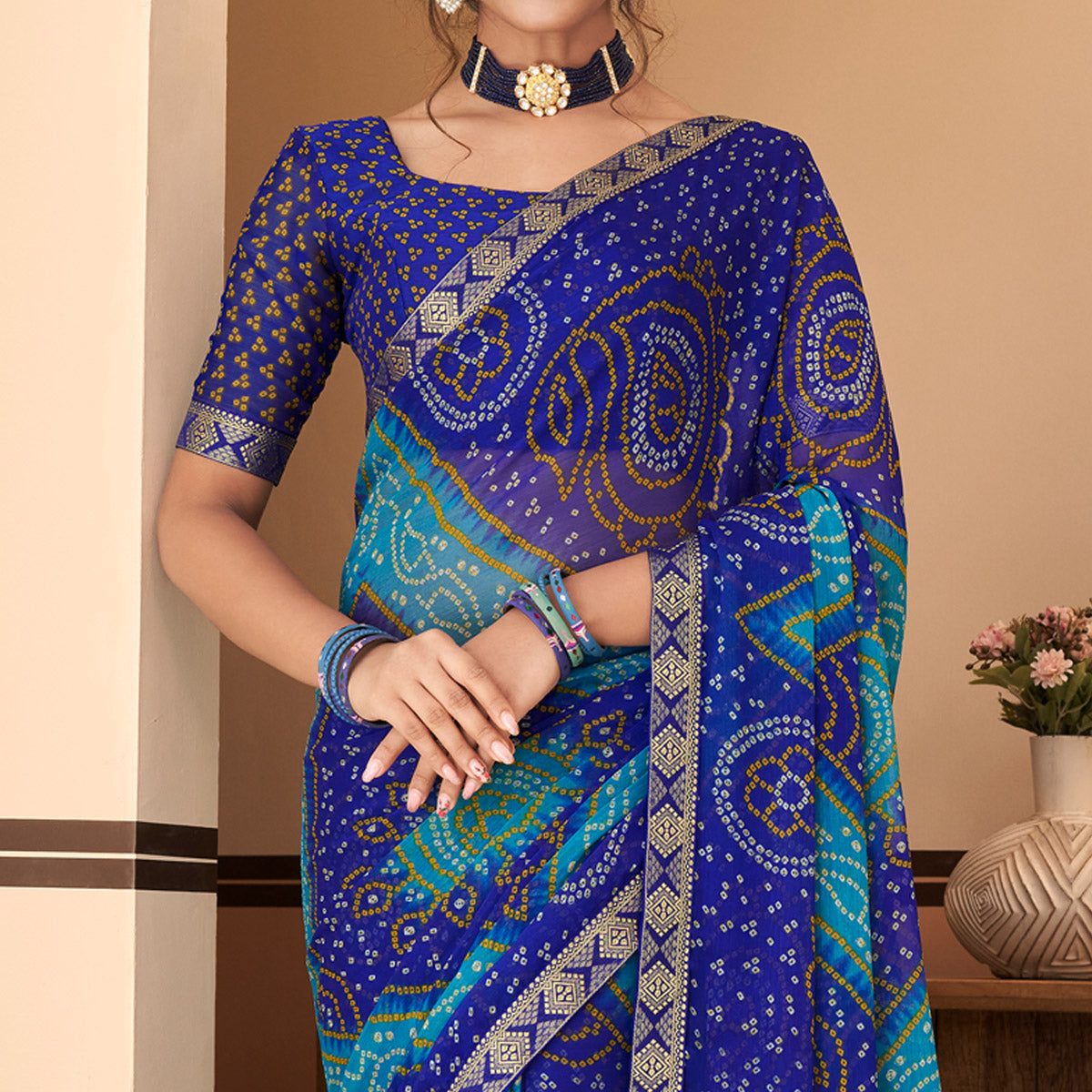 Blue Bandhani Printed Chiffon Saree With Lace Border