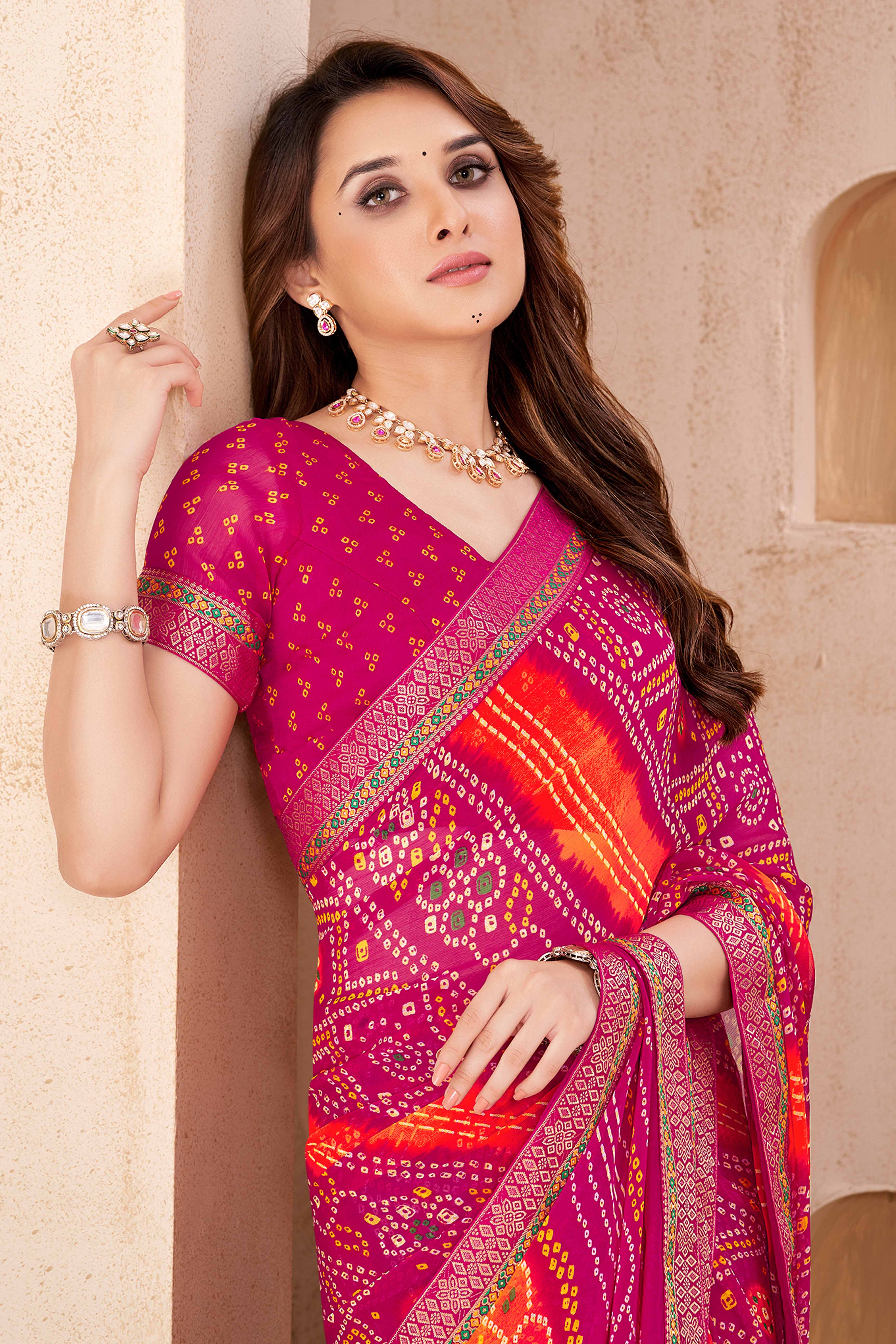 Magenta Bandhani Printed Chiffon Saree Enhanced with Delicate Lace Border Work