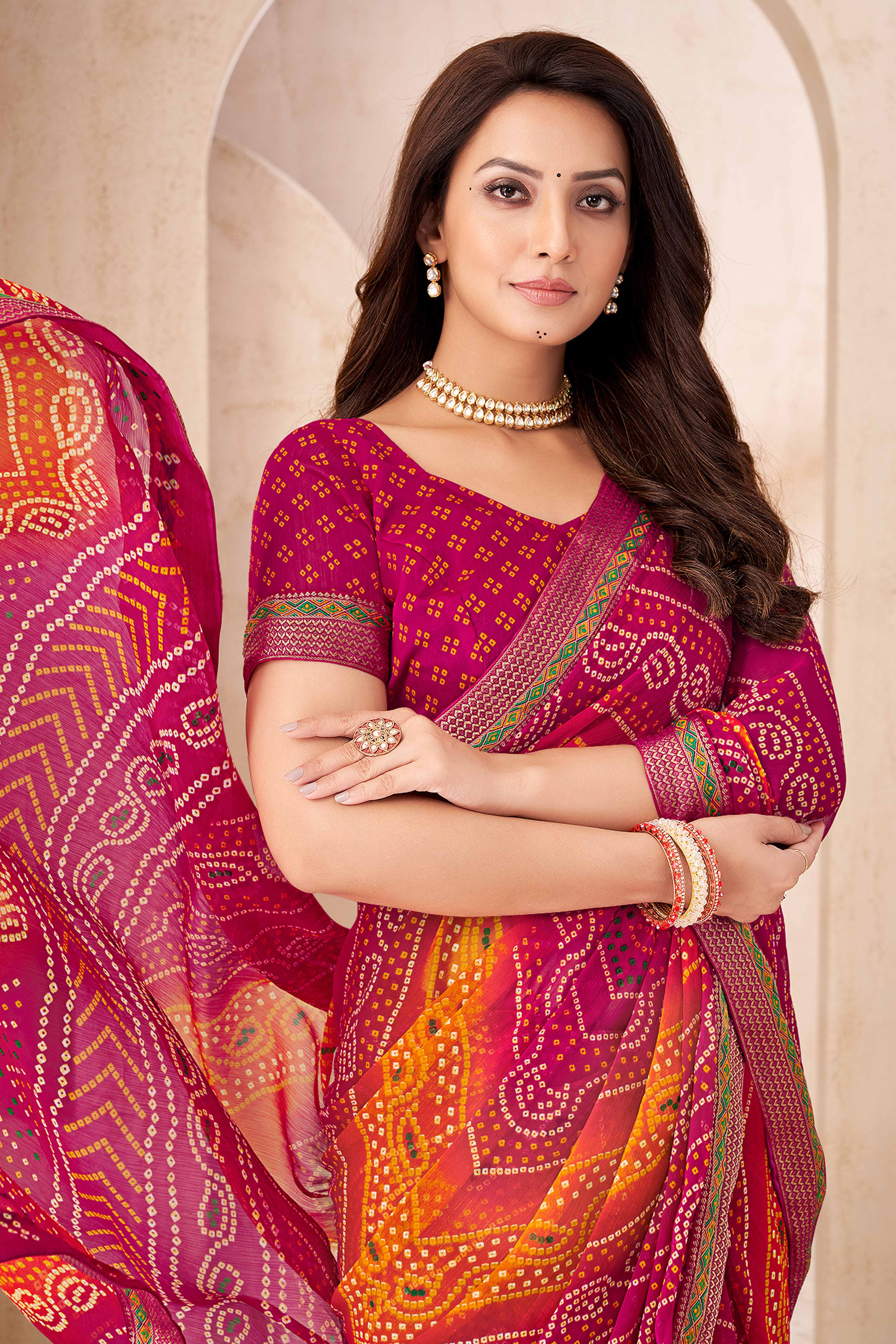 Magenta & Orange Bandhani Printed Chiffon Saree Enhanced with Delicate Lace Border Work