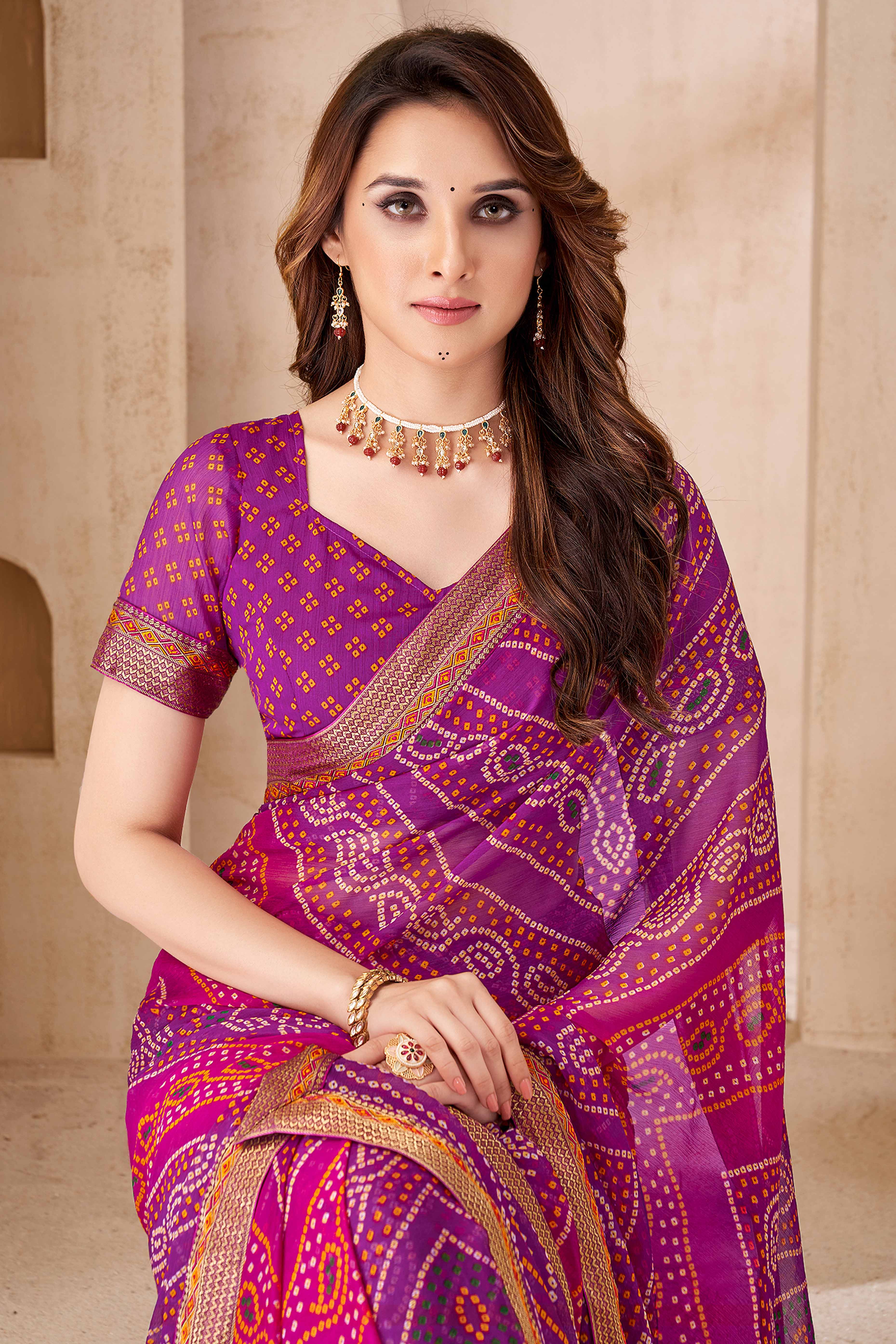 Purple Bandhani Printed Chiffon Saree Enhanced with Delicate Lace Border Work