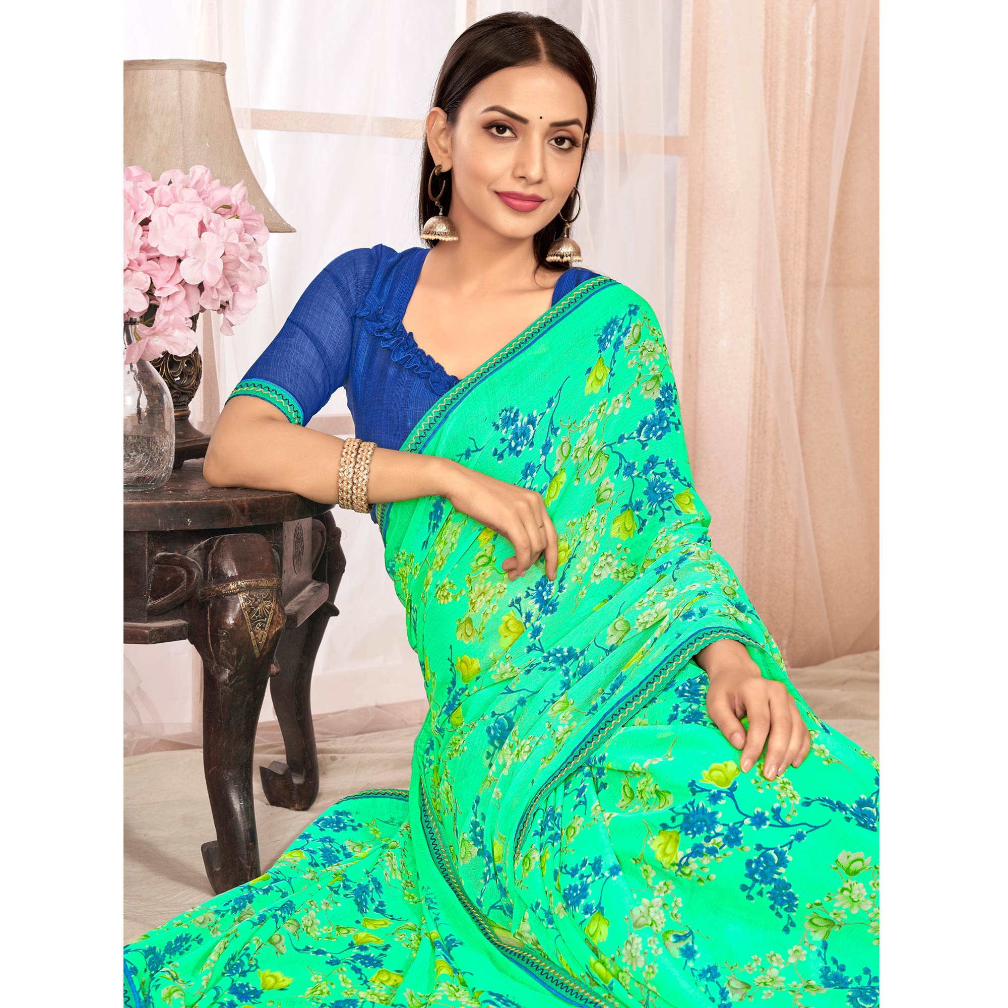 Mint Green Floral Printed Chiffon Saree With Lace Border