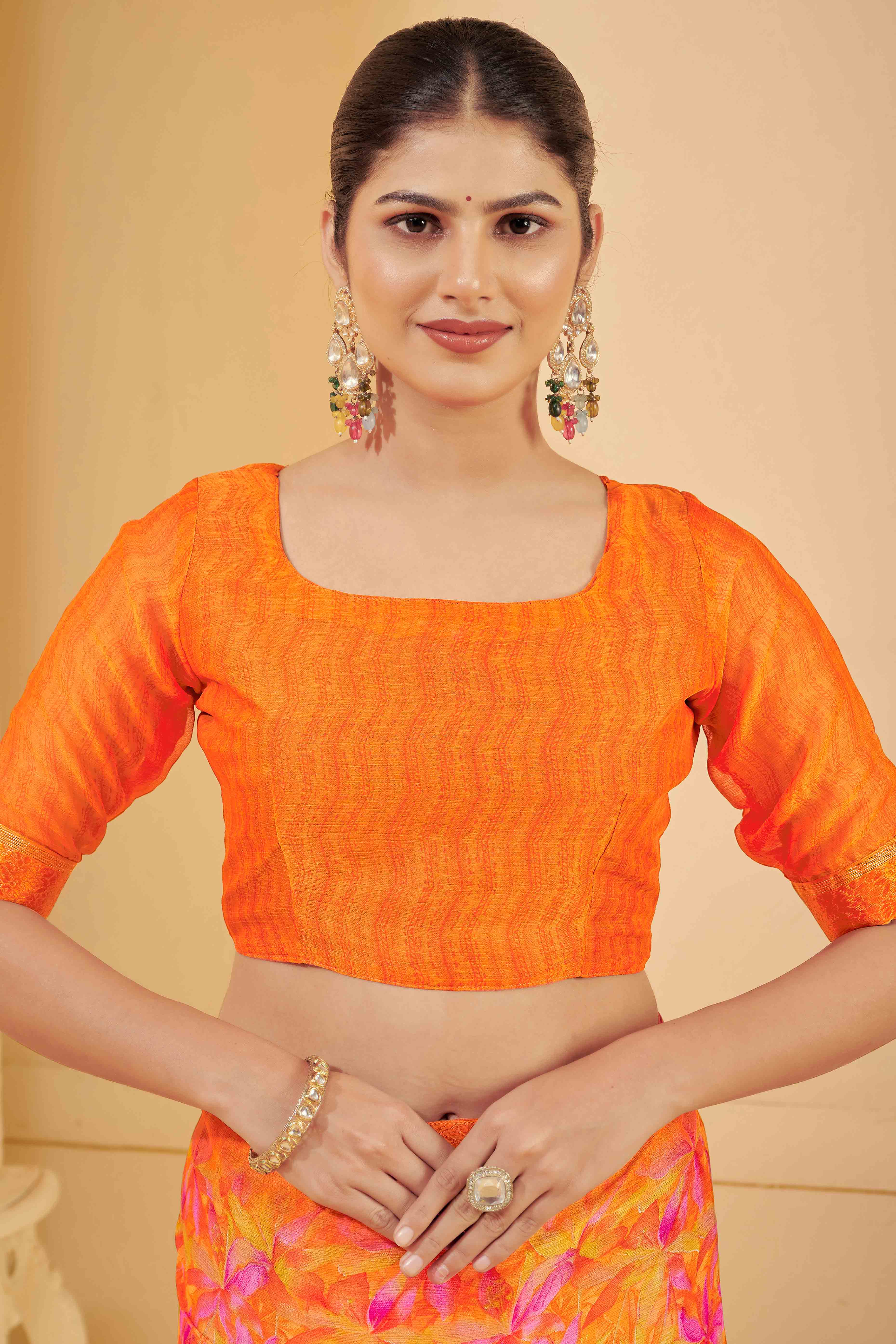 Orange Chiffon Saree Adorned With Artistic Floral Print & Finely Crafted Woven Lace Border