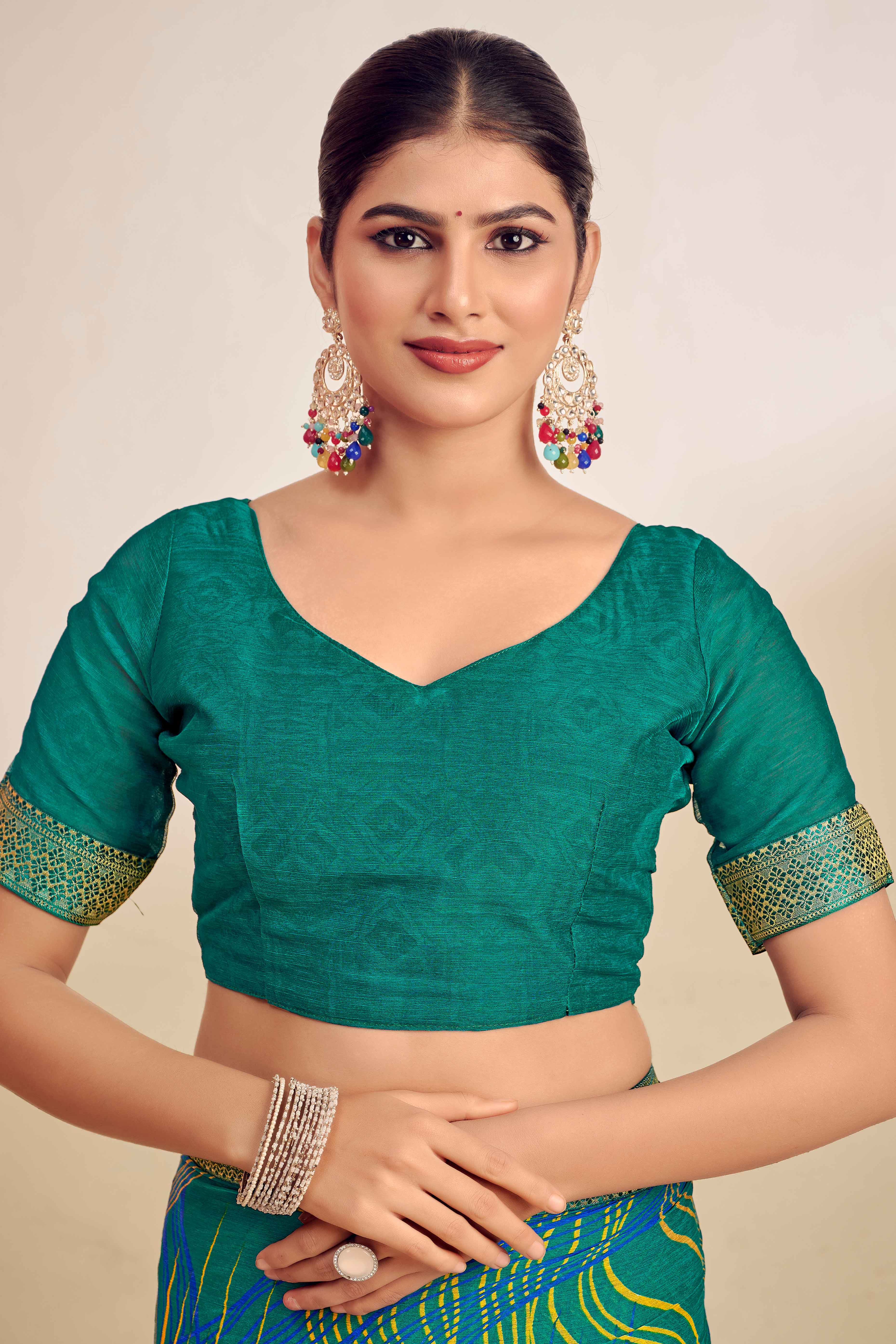 Teal Chiffon Saree Adorned With Artistic Print & Finely Crafted Woven Lace Border