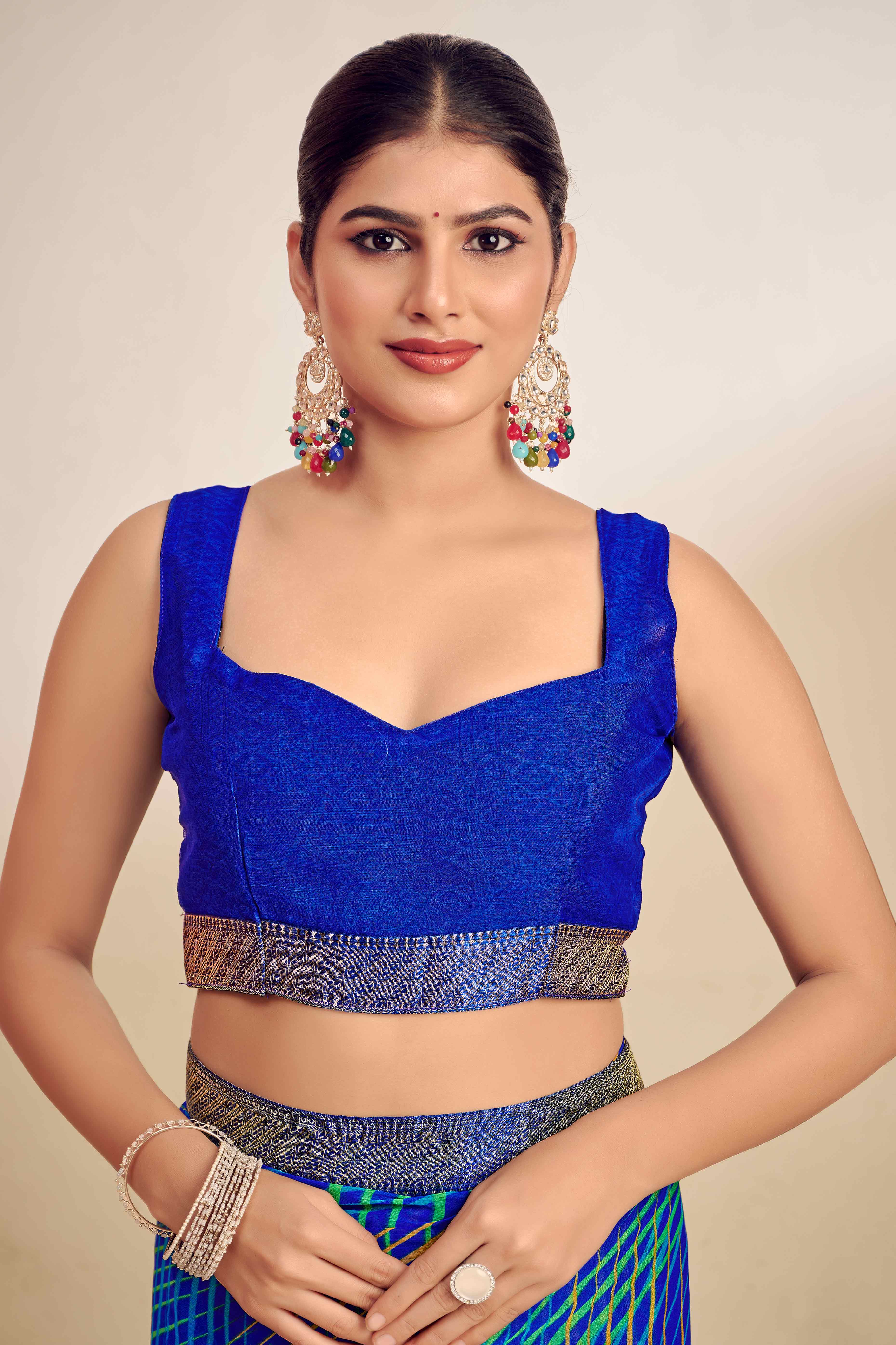 Blue Chiffon Saree Adorned With Artistic Print & Finely Crafted Woven Lace Border