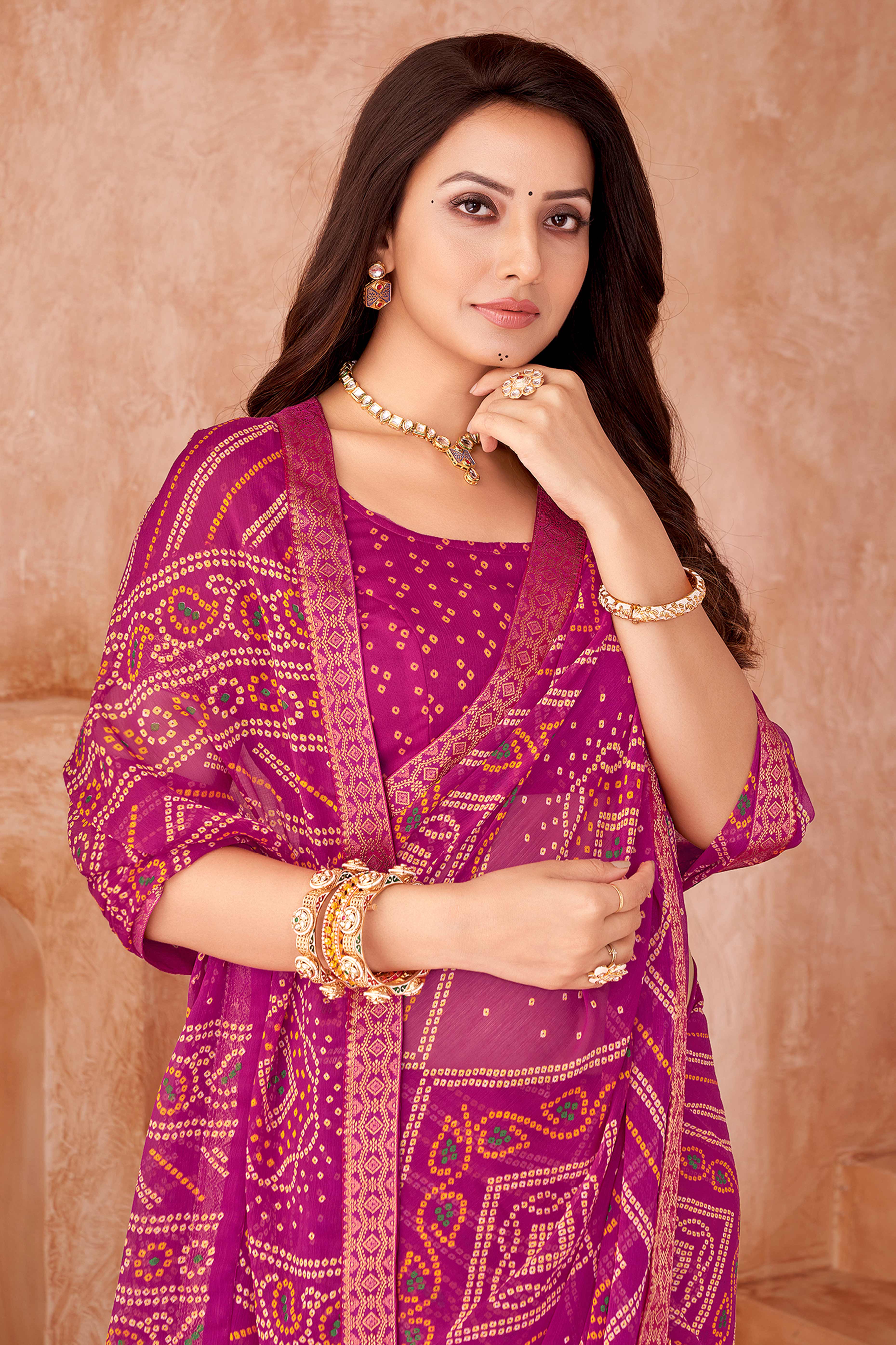 Magenta Chiffon Saree Featuring Traditional Bandhani Prints & A Graceful Lace Edge