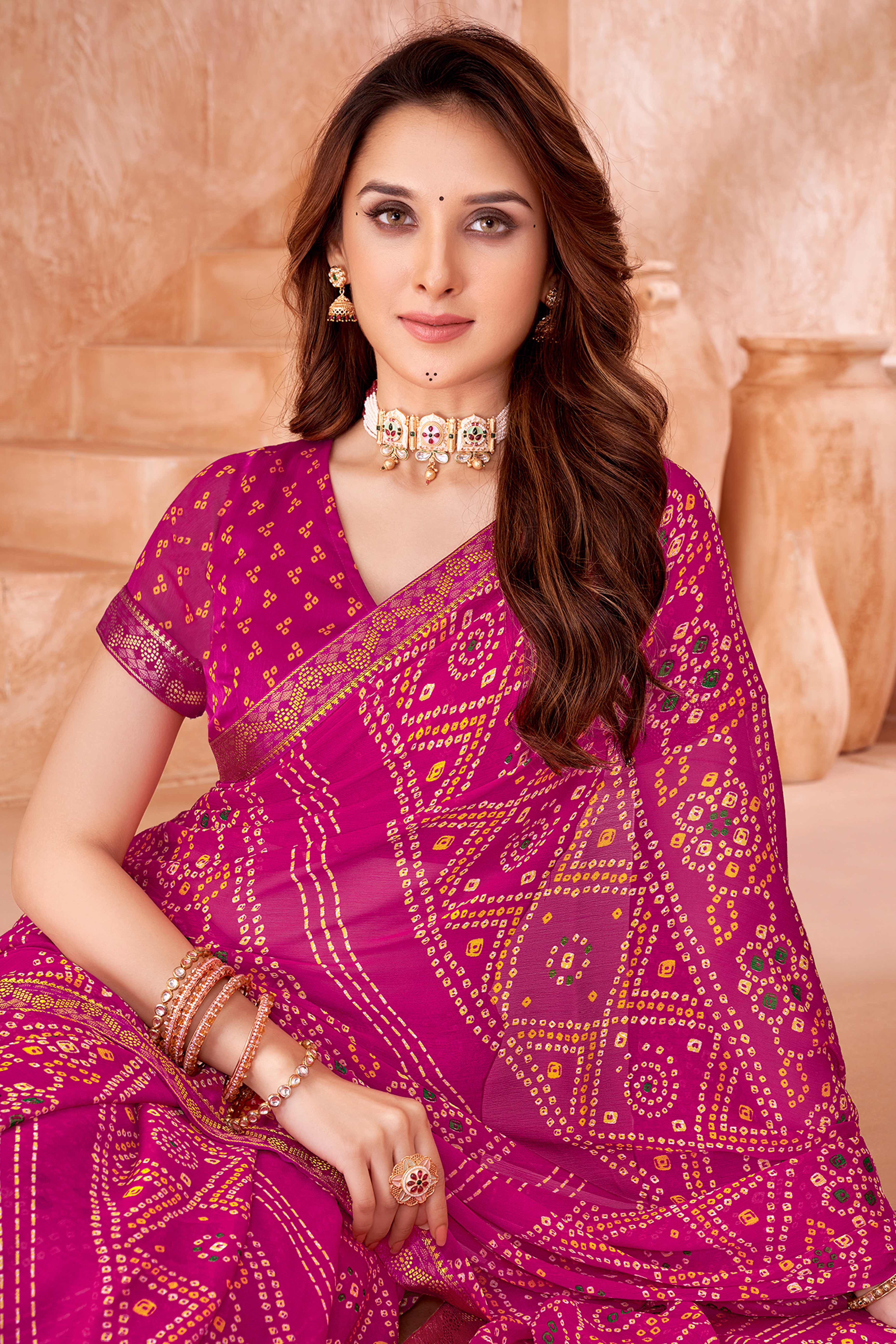 Magenta Chiffon Saree Featuring Traditional Bandhani Prints & A Graceful Lace Edge