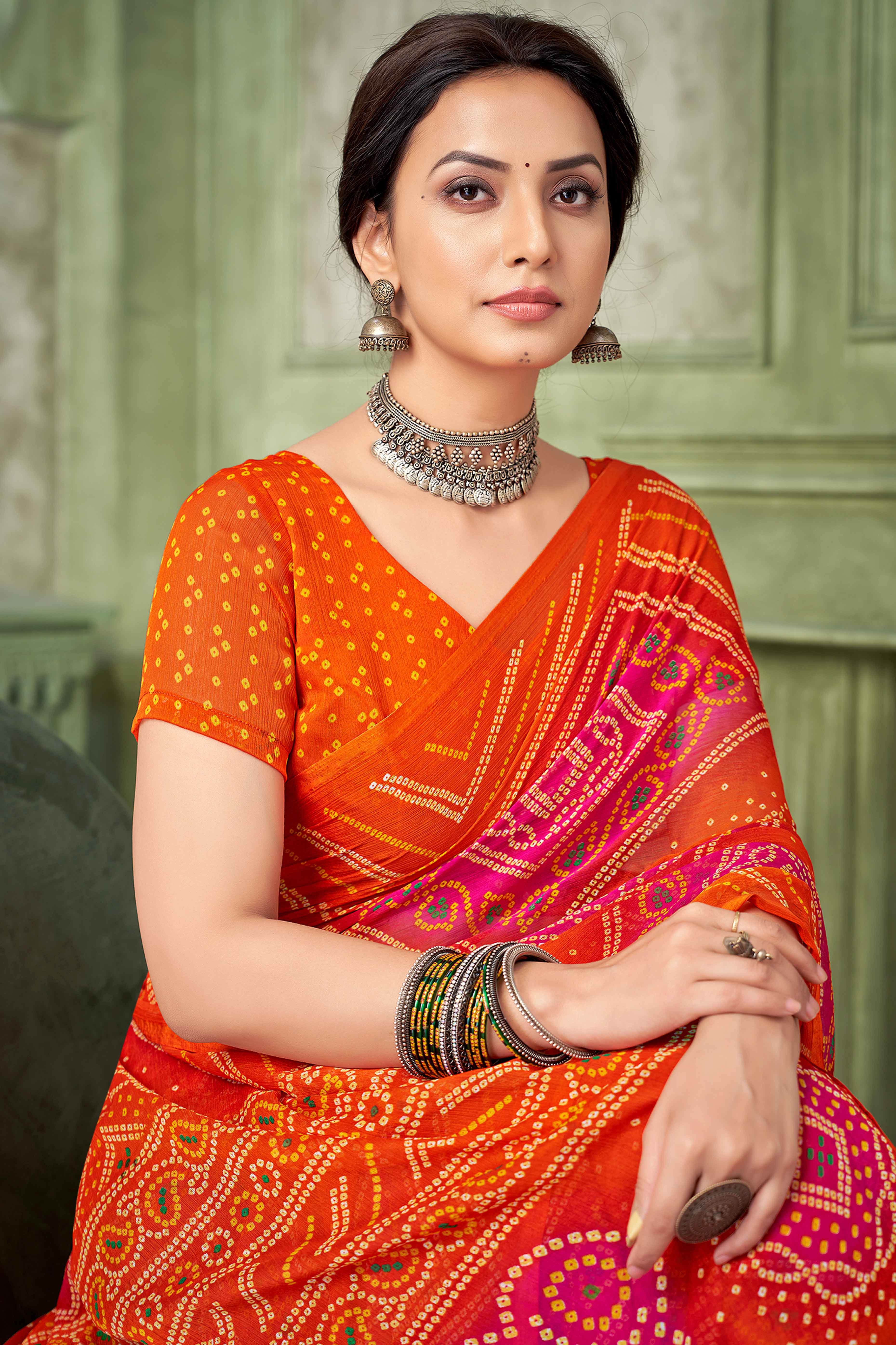 Orange Chiffon Saree Adorned With Traditional Bandhani Print