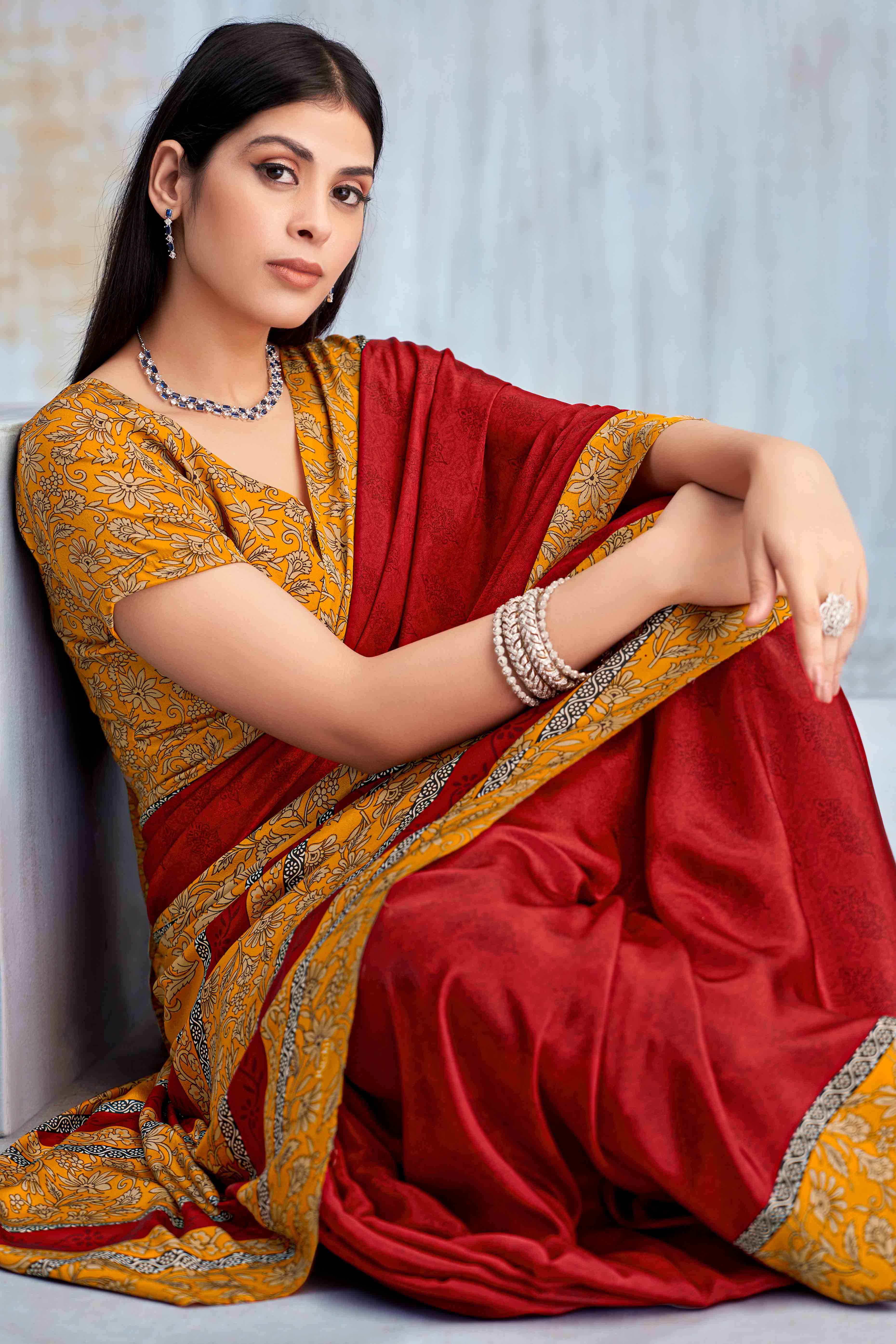 Red Crepe Silk Saree Featuring Delicate Floral Print Work