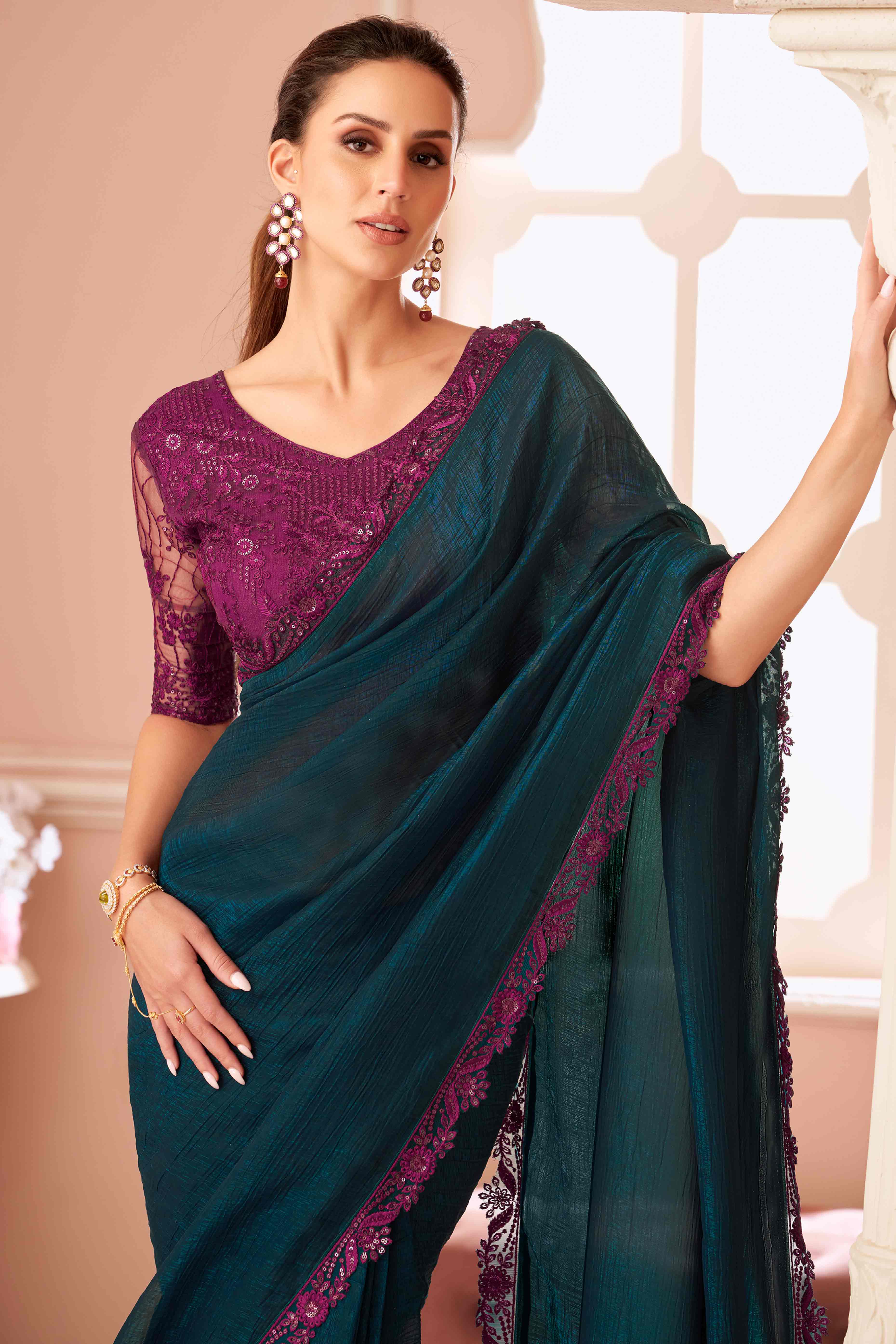 Teal Sequins Embroidered Georgette Saree