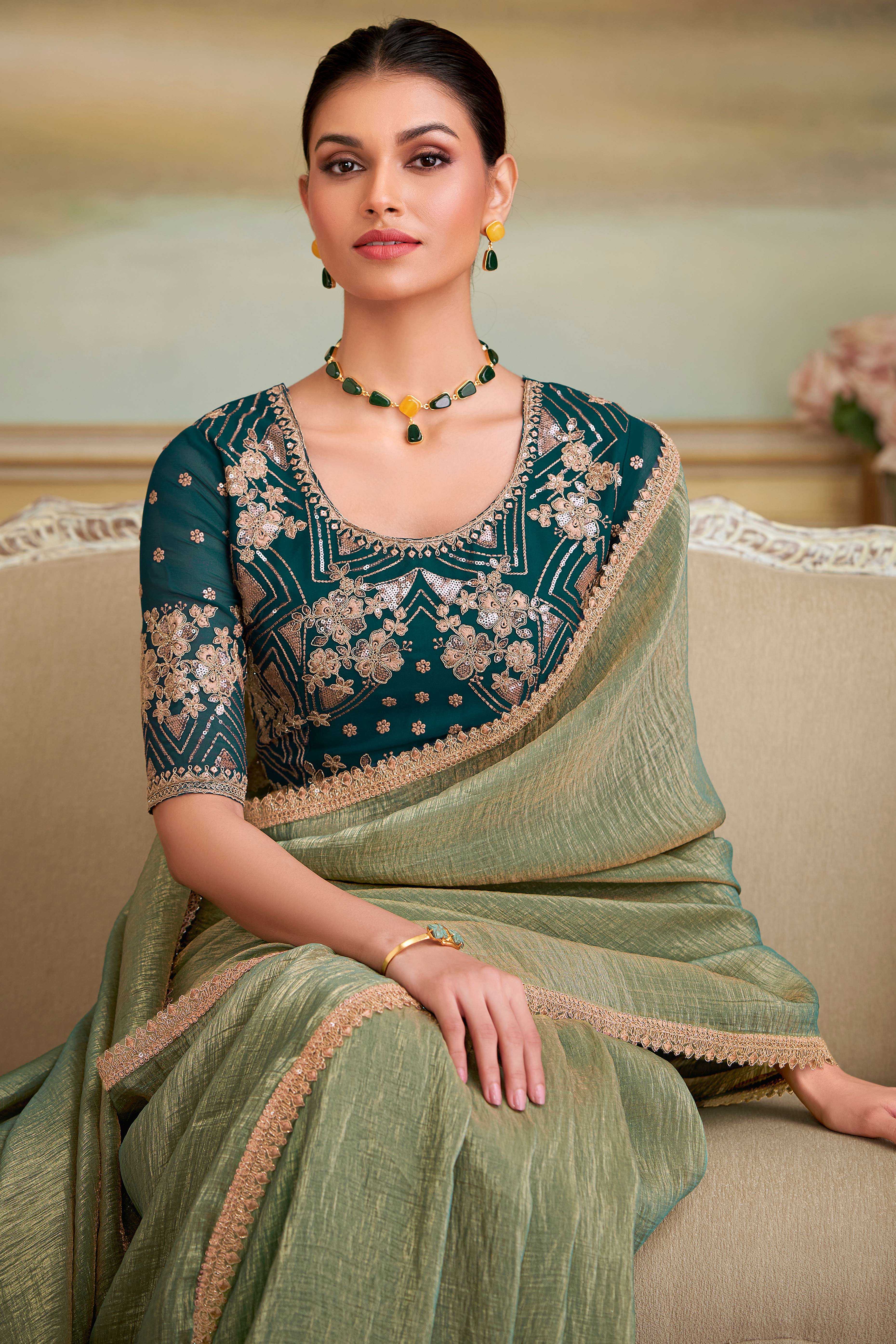 Captivating Pista Green Georgette Saree Beautified With Floral Sequins Embroidery Lace Border