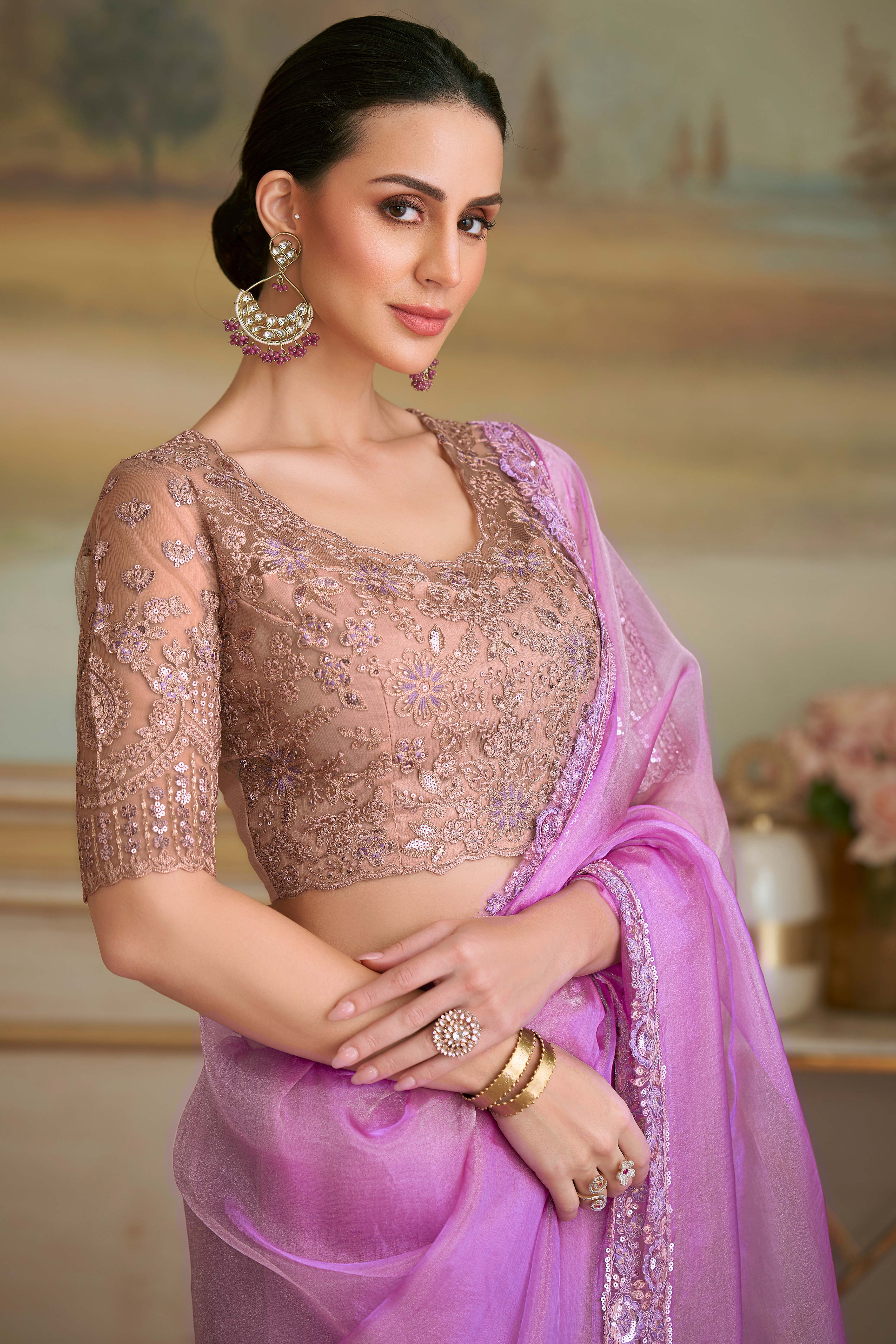 Lustrous Light Magenta Solid Tissue Silk Saree Showcasing Sequins Embroidered & Stylish Lace Border