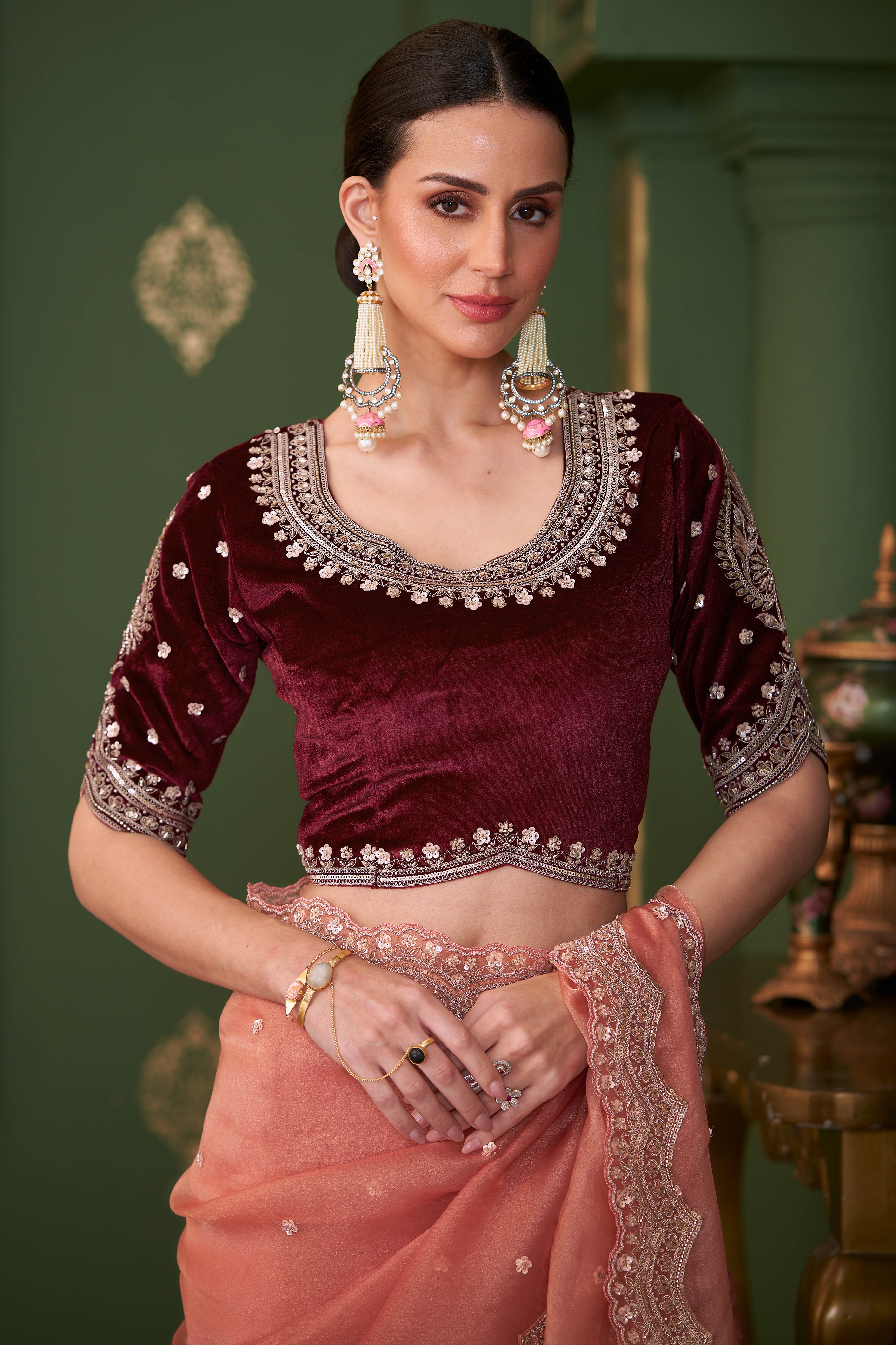 Charming Peach Georgette Saree Adorned With Floral Cording Sequins Embroidery & Cutwork Border