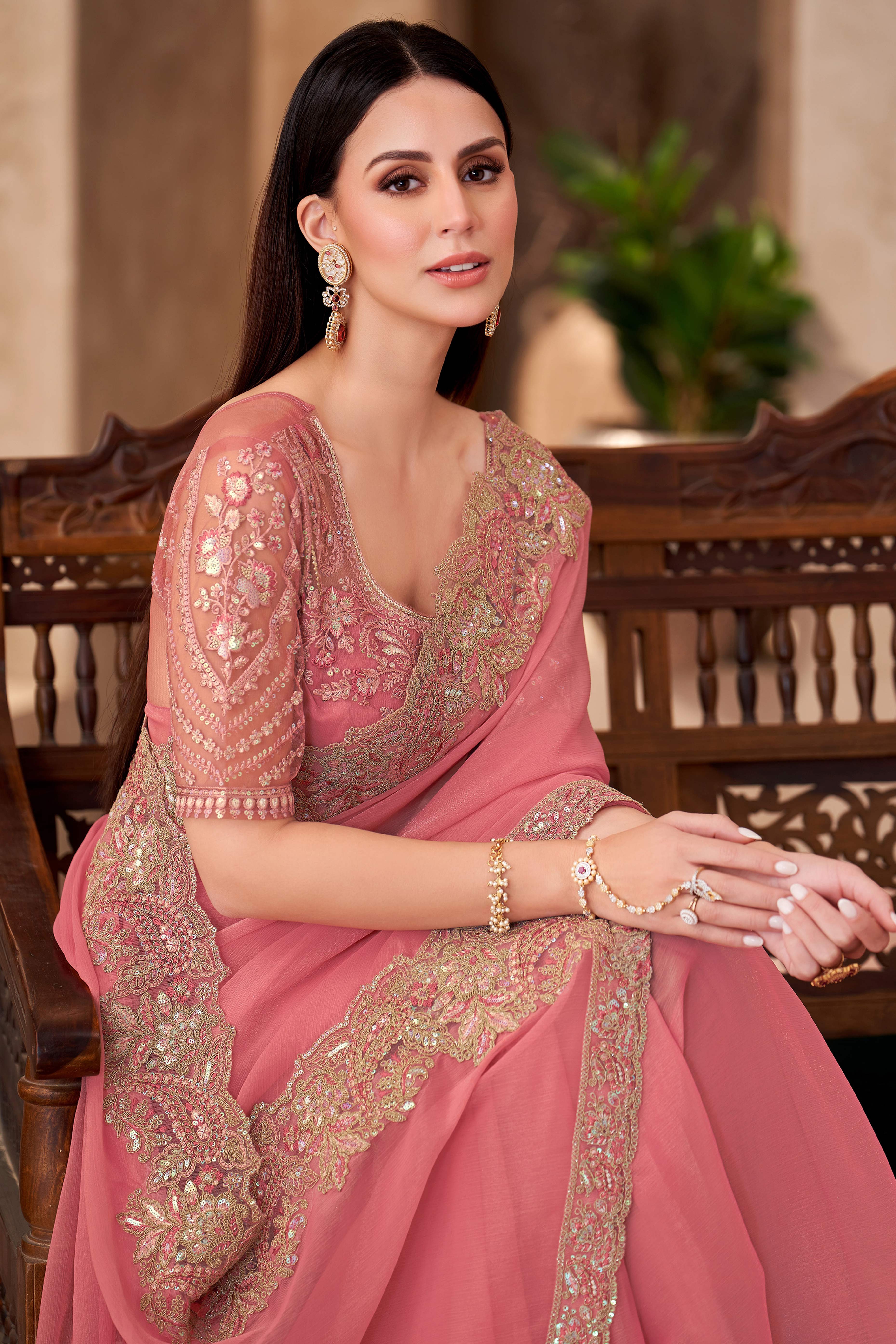 Party Perfect Peach Georgette Saree with Shimmering Sequin and Thread Embroidery