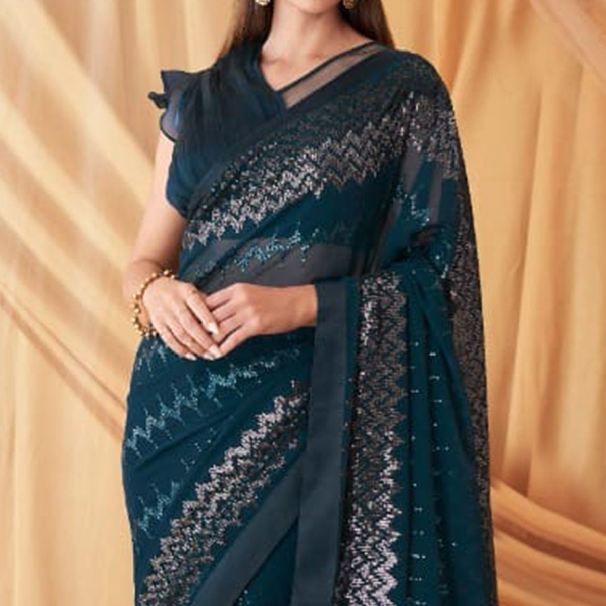 Teal Blue Sequins Embroidered Georgette Saree With Tassels