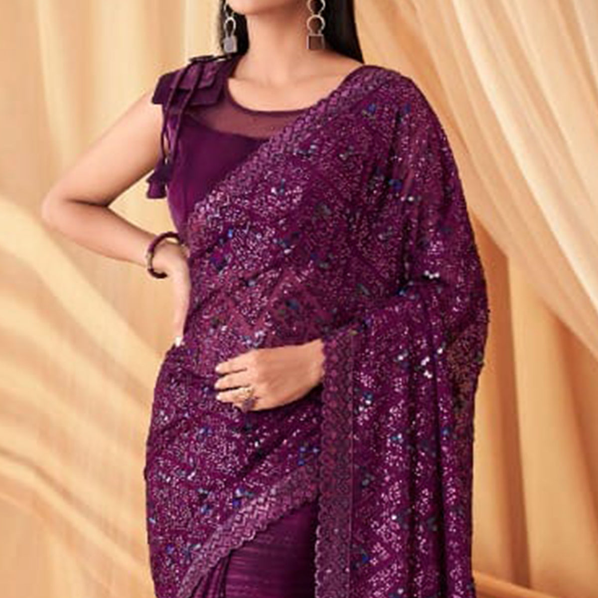 Purple Sequins Embroidered Georgette Saree With Tassels