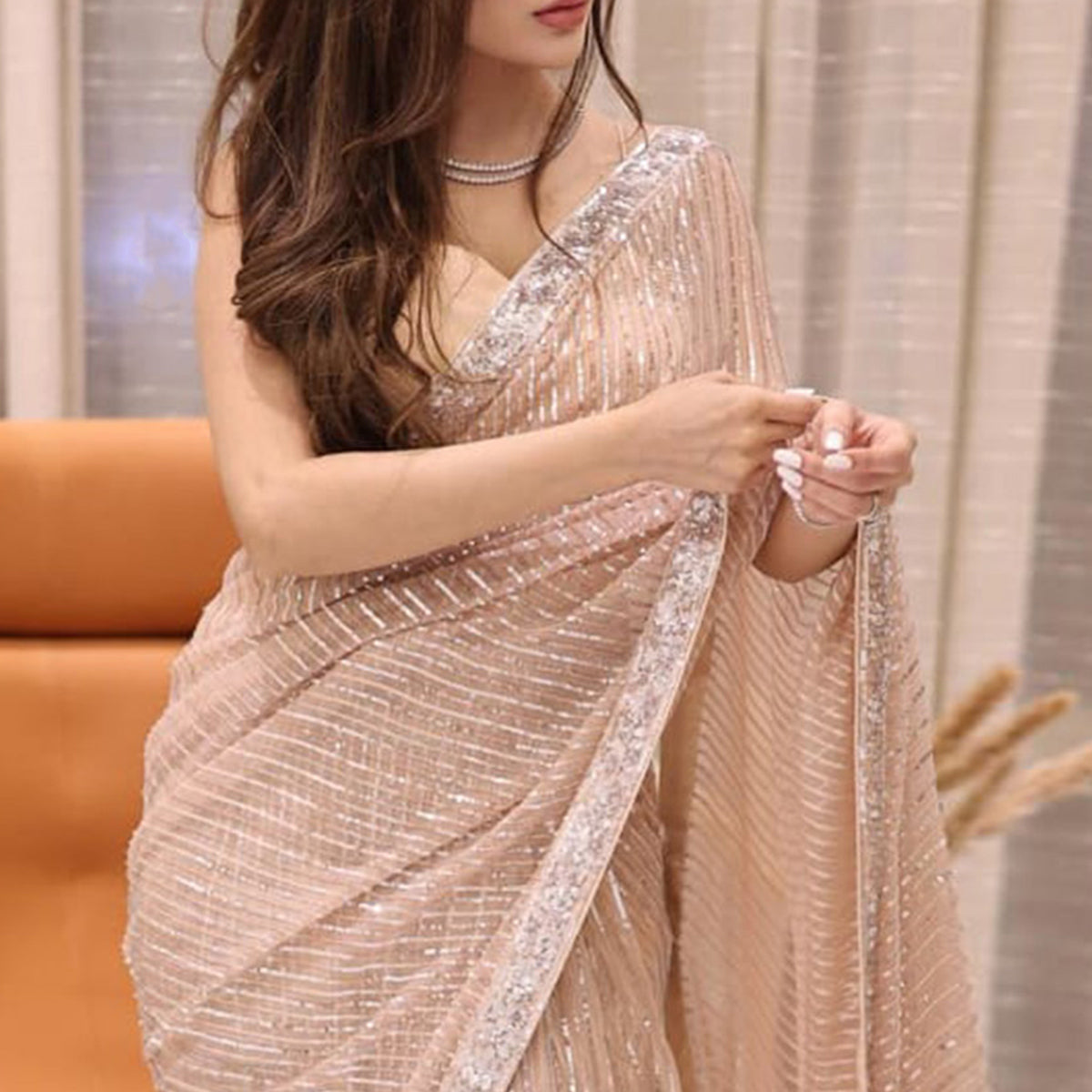 Peach Sequins Embroidered Georgette Saree
