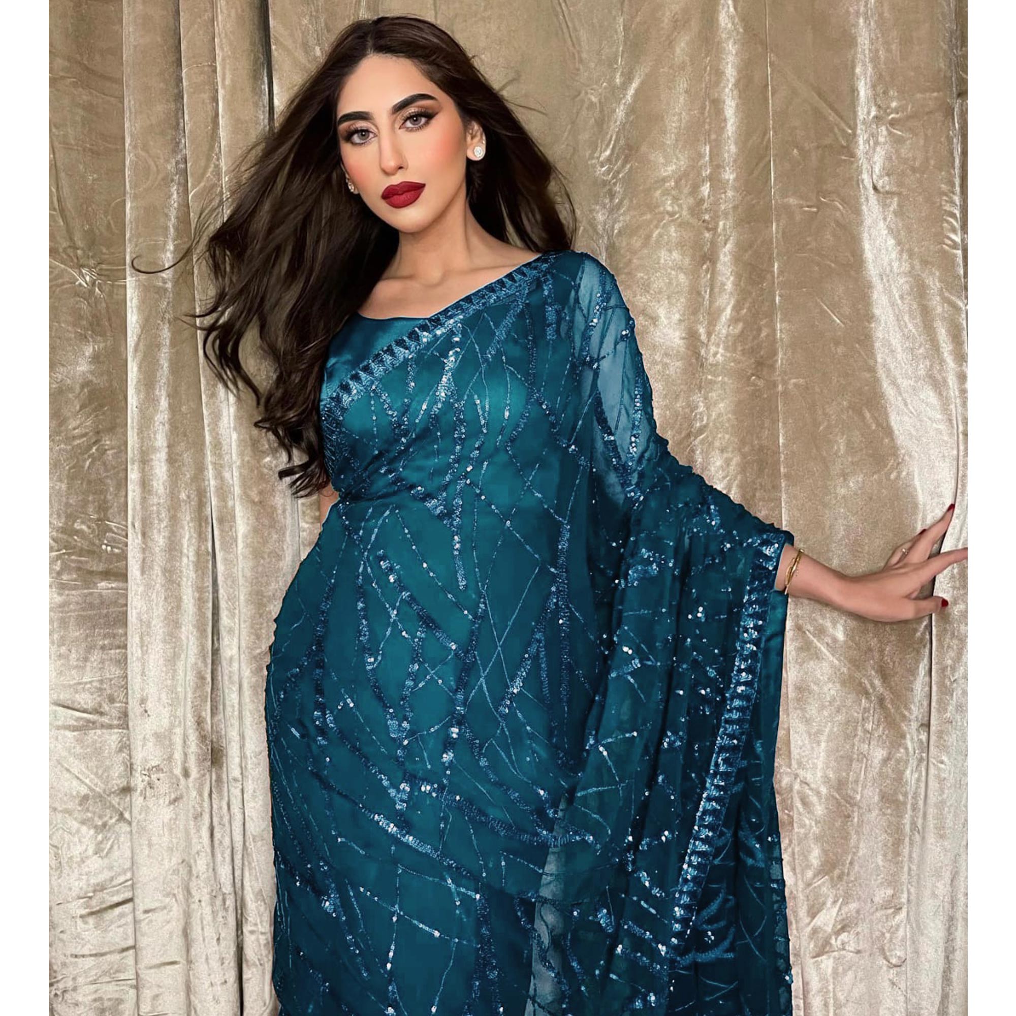 Teal Sequins Embroidered Georgette Saree
