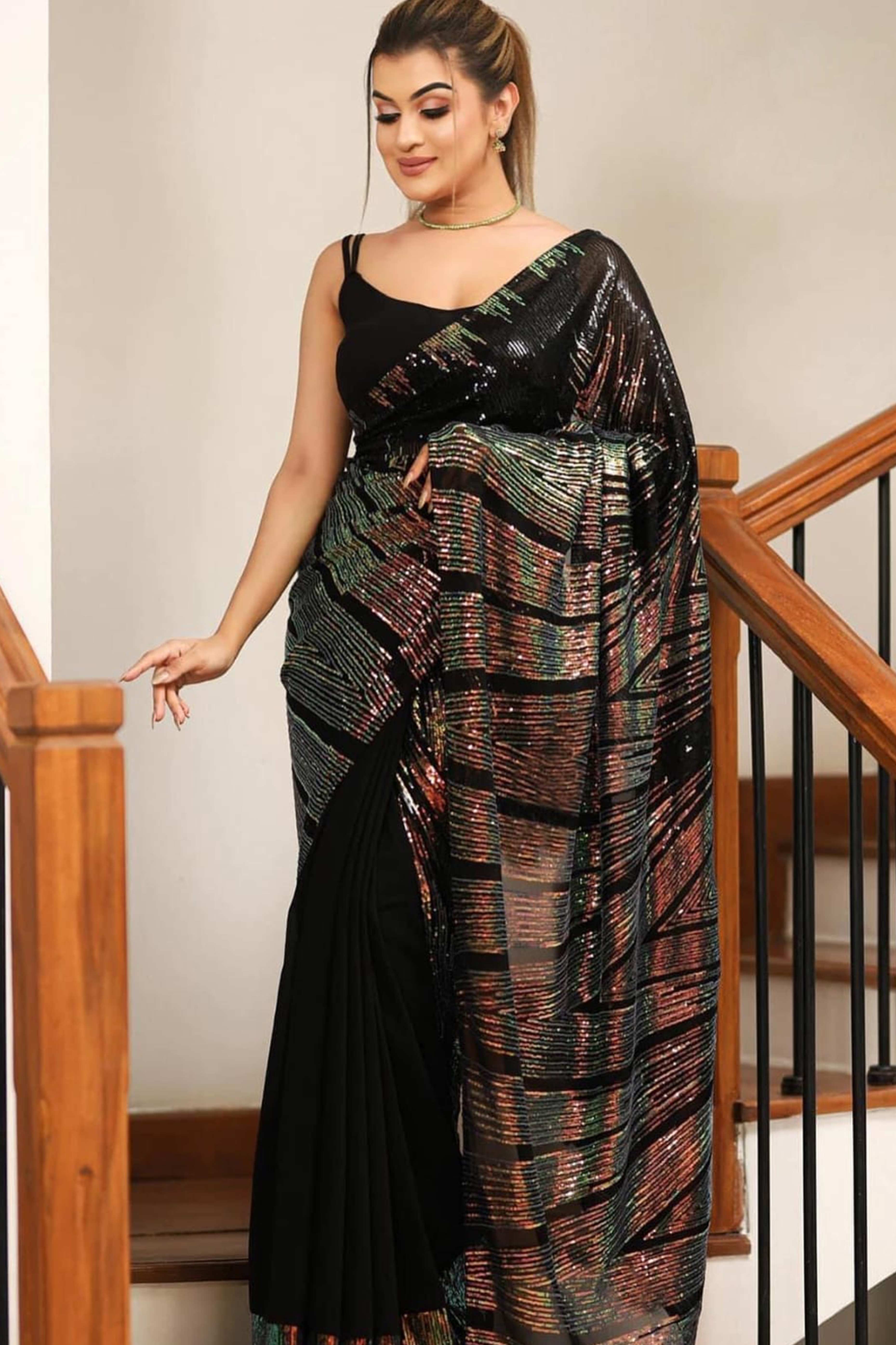 Stunning Black Georgette Partywear Saree Adorned with All-Over Sequin Embellishments
